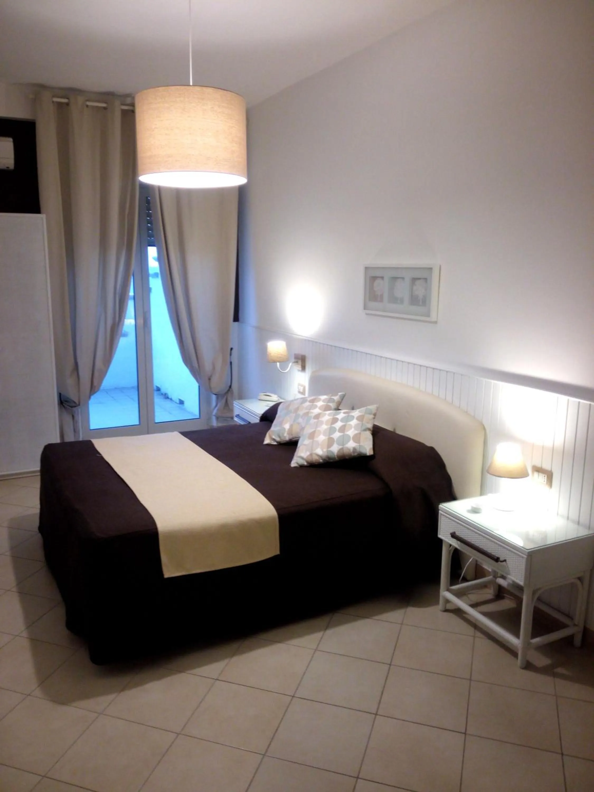Photo of the whole room, Bed in Mini Hotel - Angolo Di Paradiso -