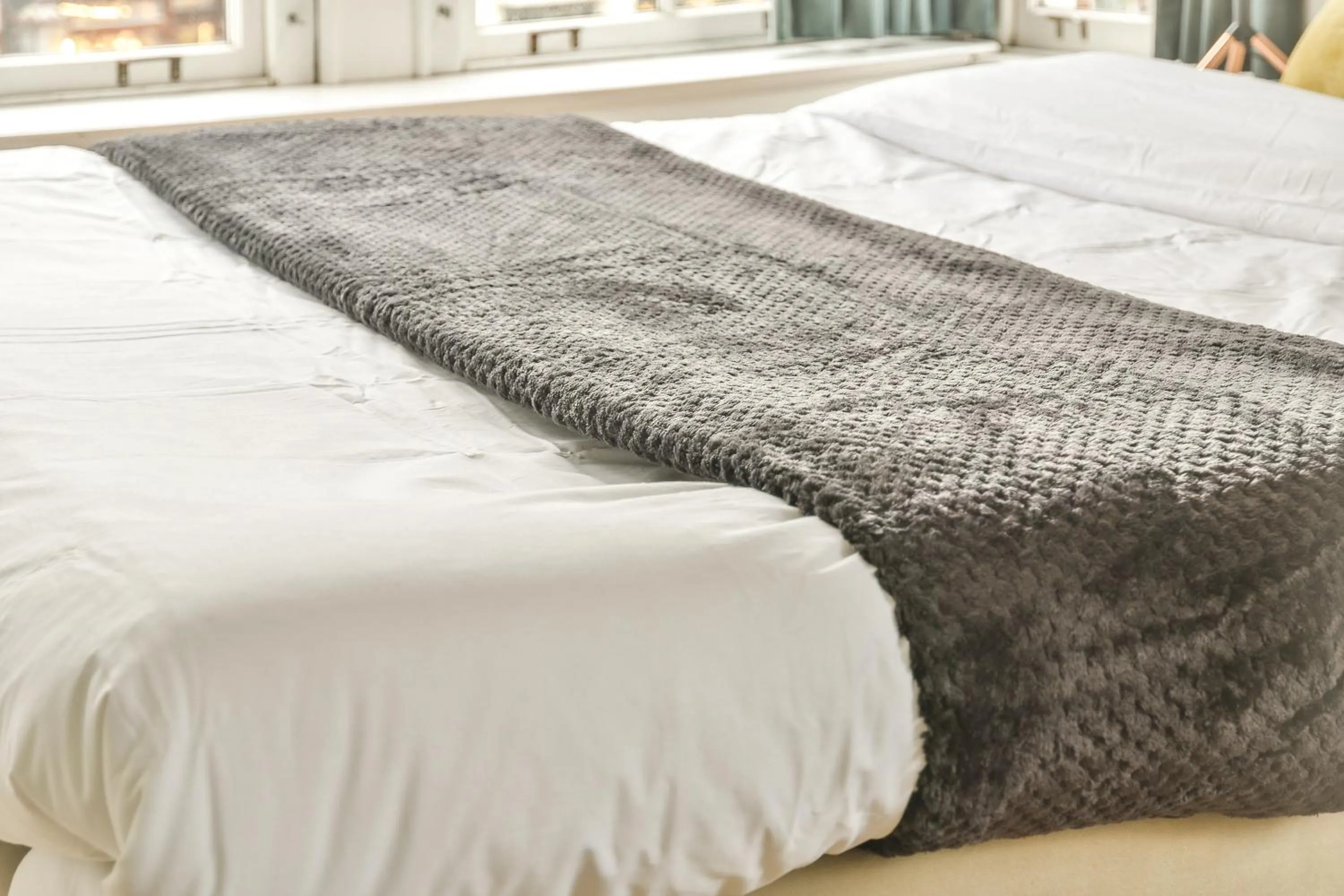 Bed in Spiegelgracht Apartments with Canal View