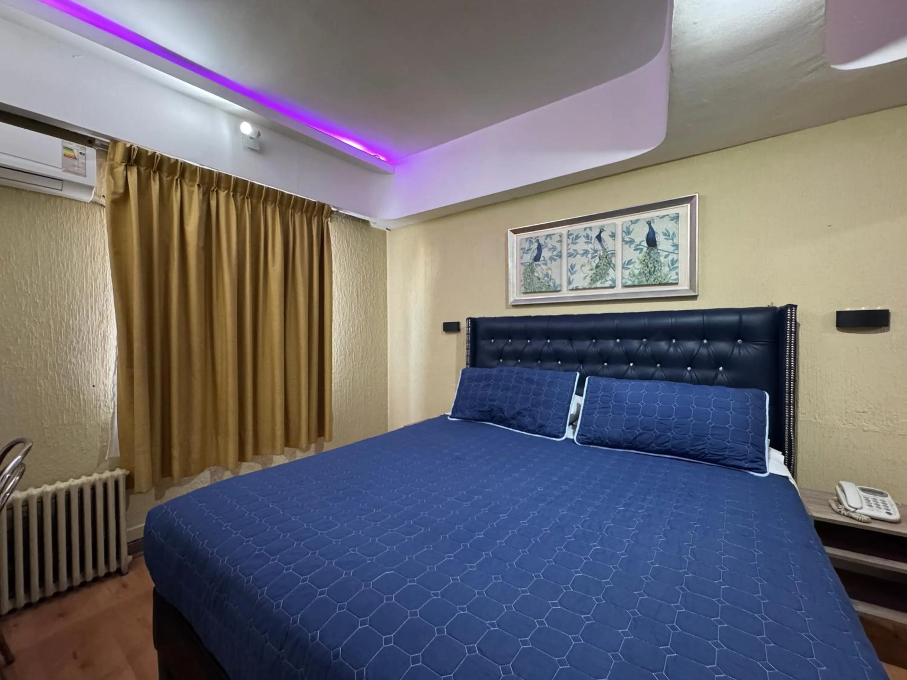 Bed in Intimo Hotel Miraflores