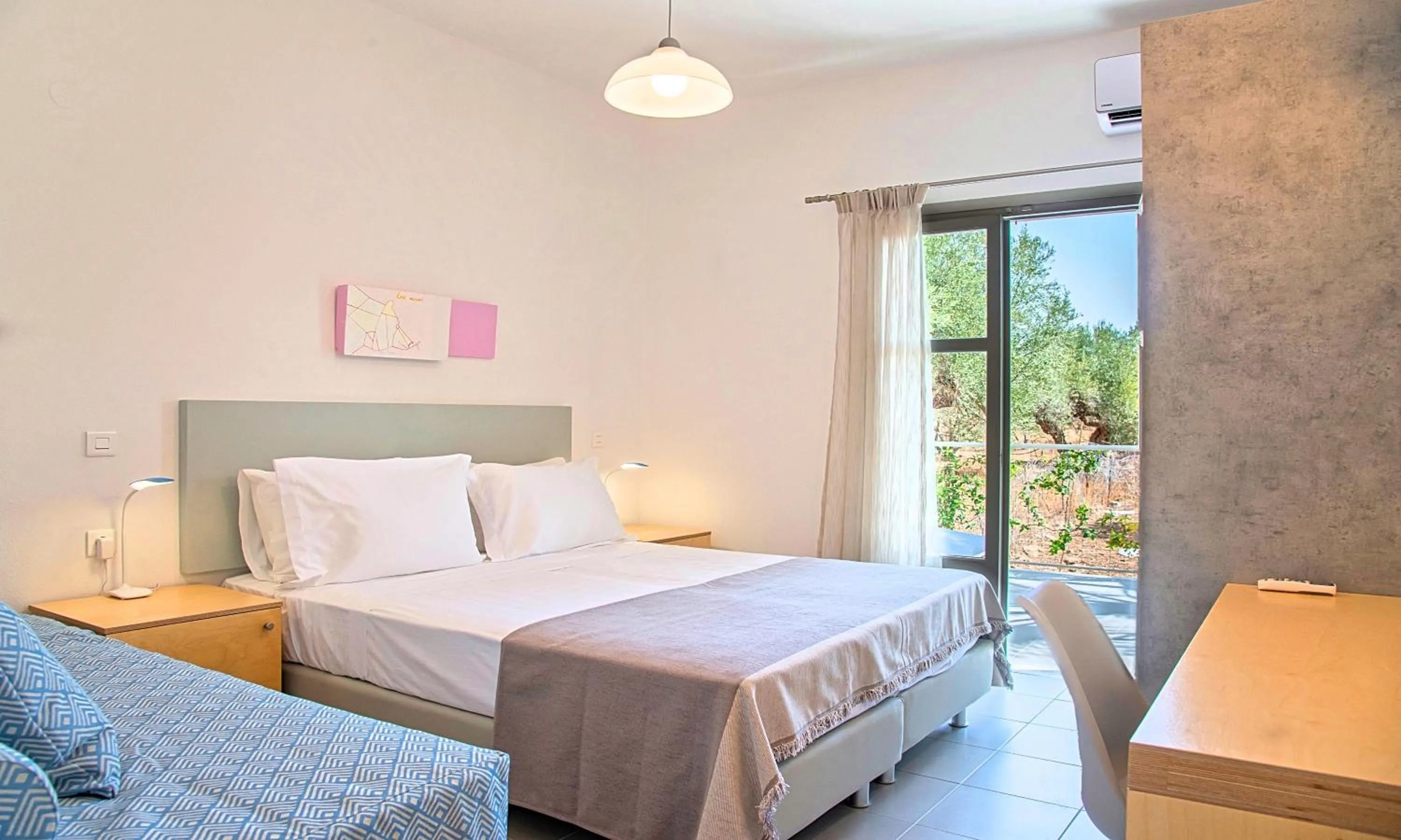 Bedroom, Bed in Elounda Garden Suites Heated Pool
