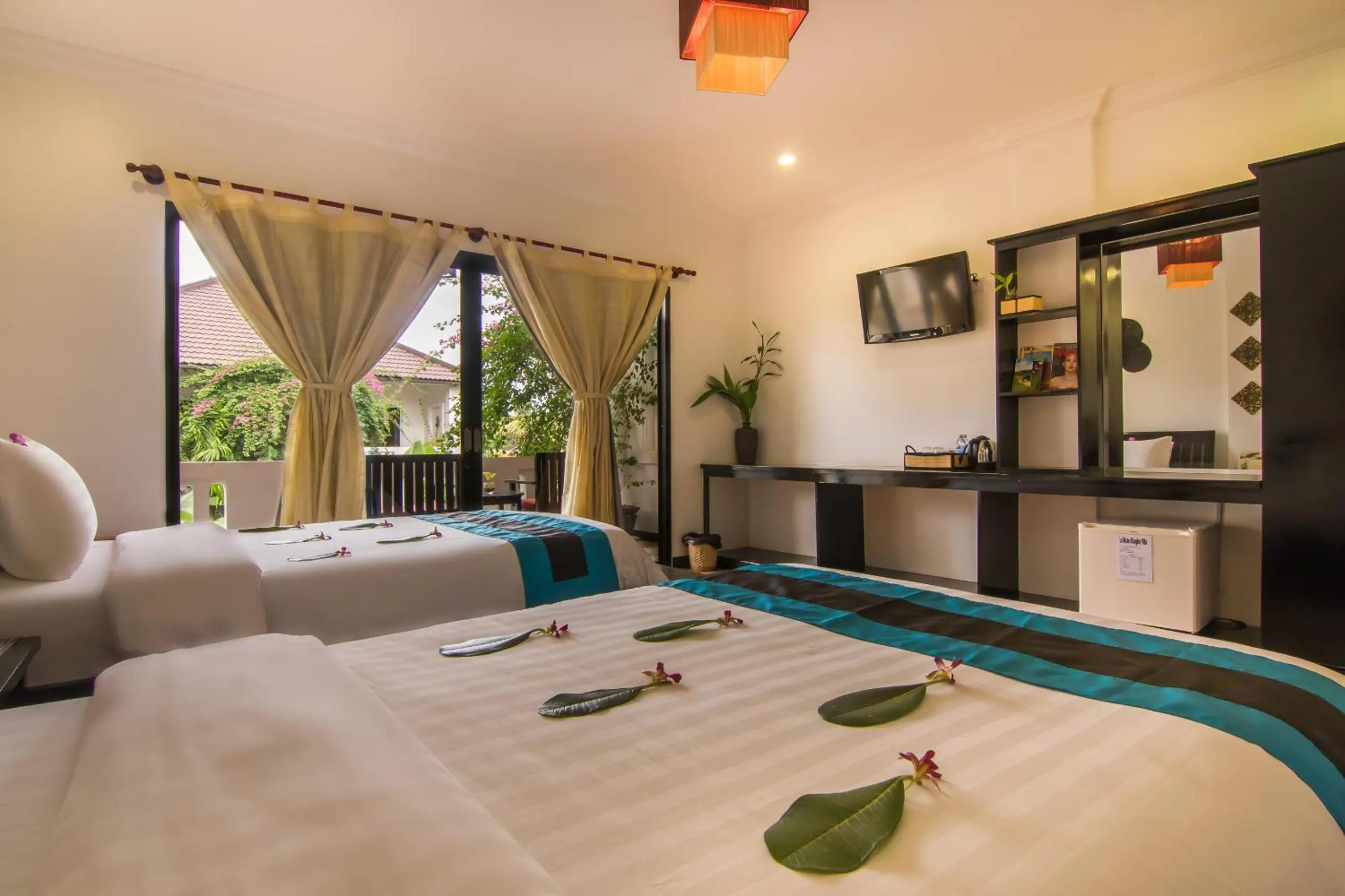 TV and multimedia, Bed in La Residence WatBo Hotel