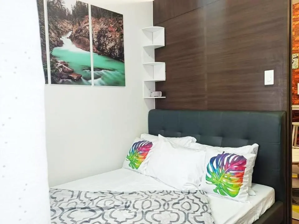 Bed in Fully Furnished 1 Bedroom at SMDC Air Residence with Balcony City View