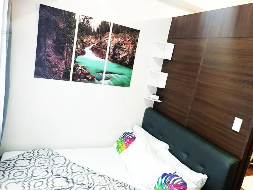 Bed in Fully Furnished 1 Bedroom at SMDC Air Residence with Balcony City View