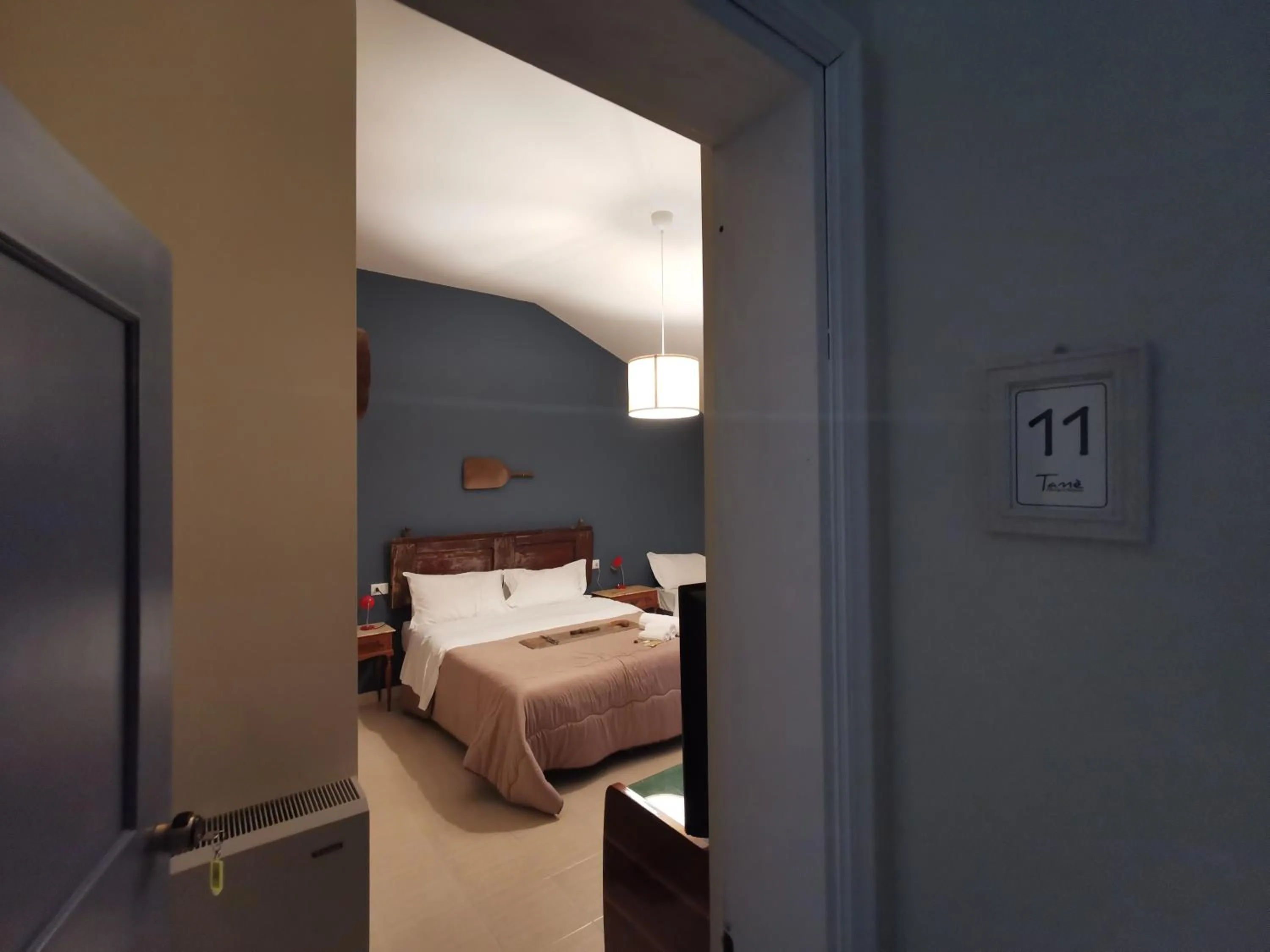 Photo of the whole room, Bed in Locanda Tanè