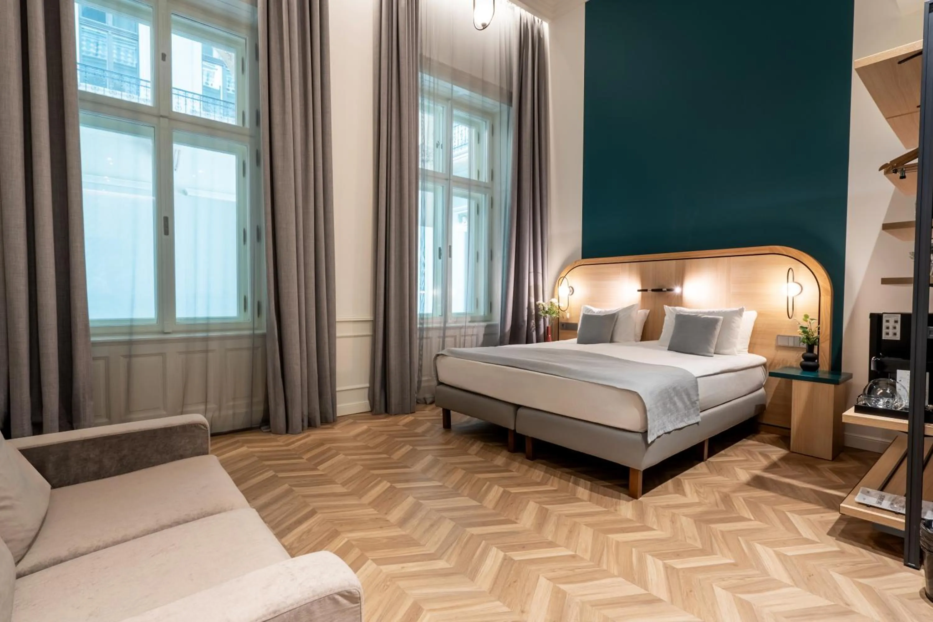 Bed in Hotel Oktogon Haggenmacher by Continental Group