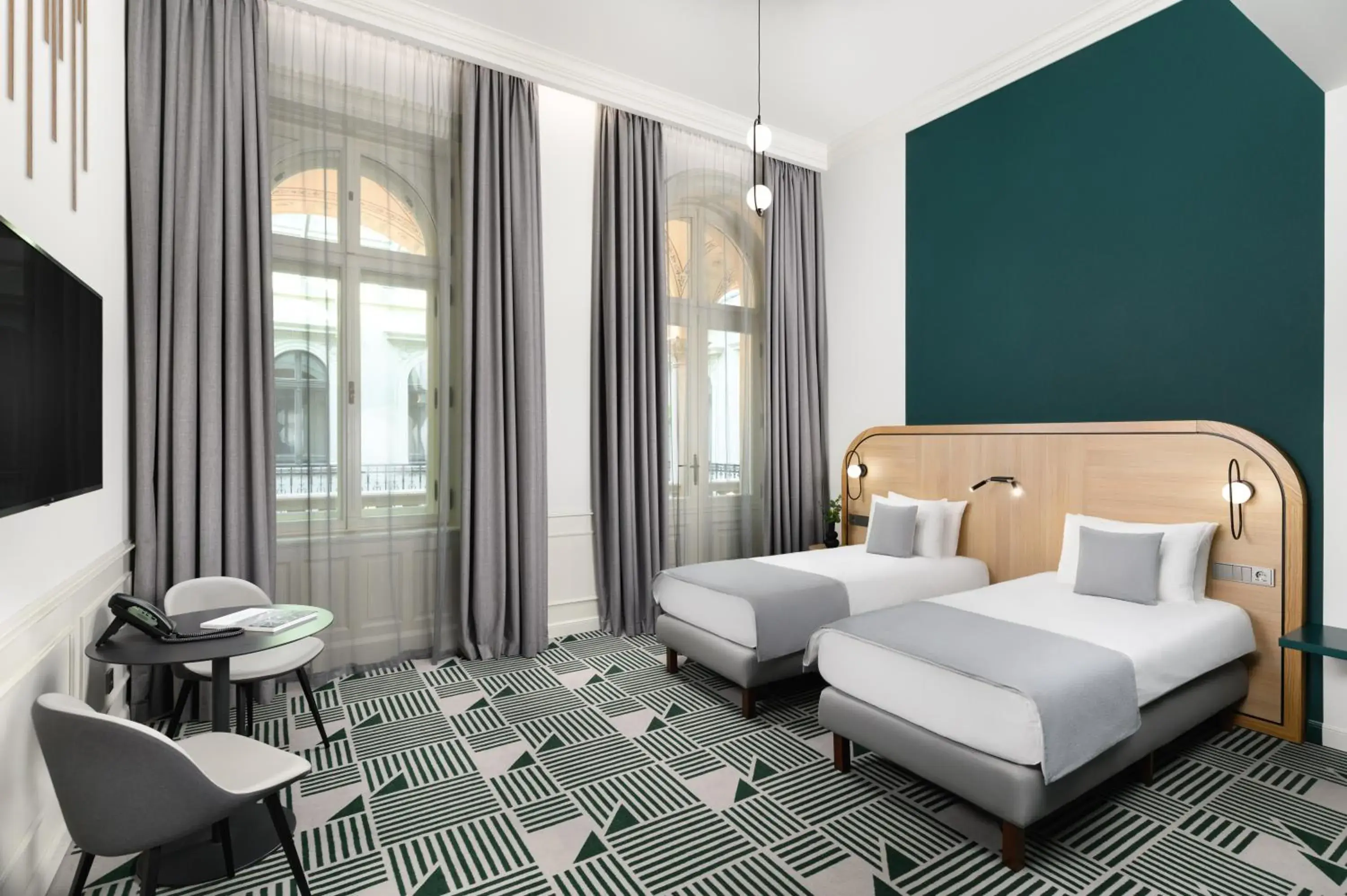 Deluxe Twin Room in Hotel Oktogon Haggenmacher by Continental Group Deluxe Twin Room in Hotel Oktogon Haggenmacher by Continental Group