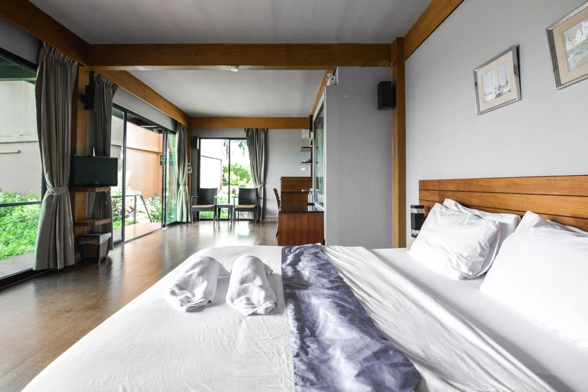 Photo of the whole room, Bed in The Grace Amphawa