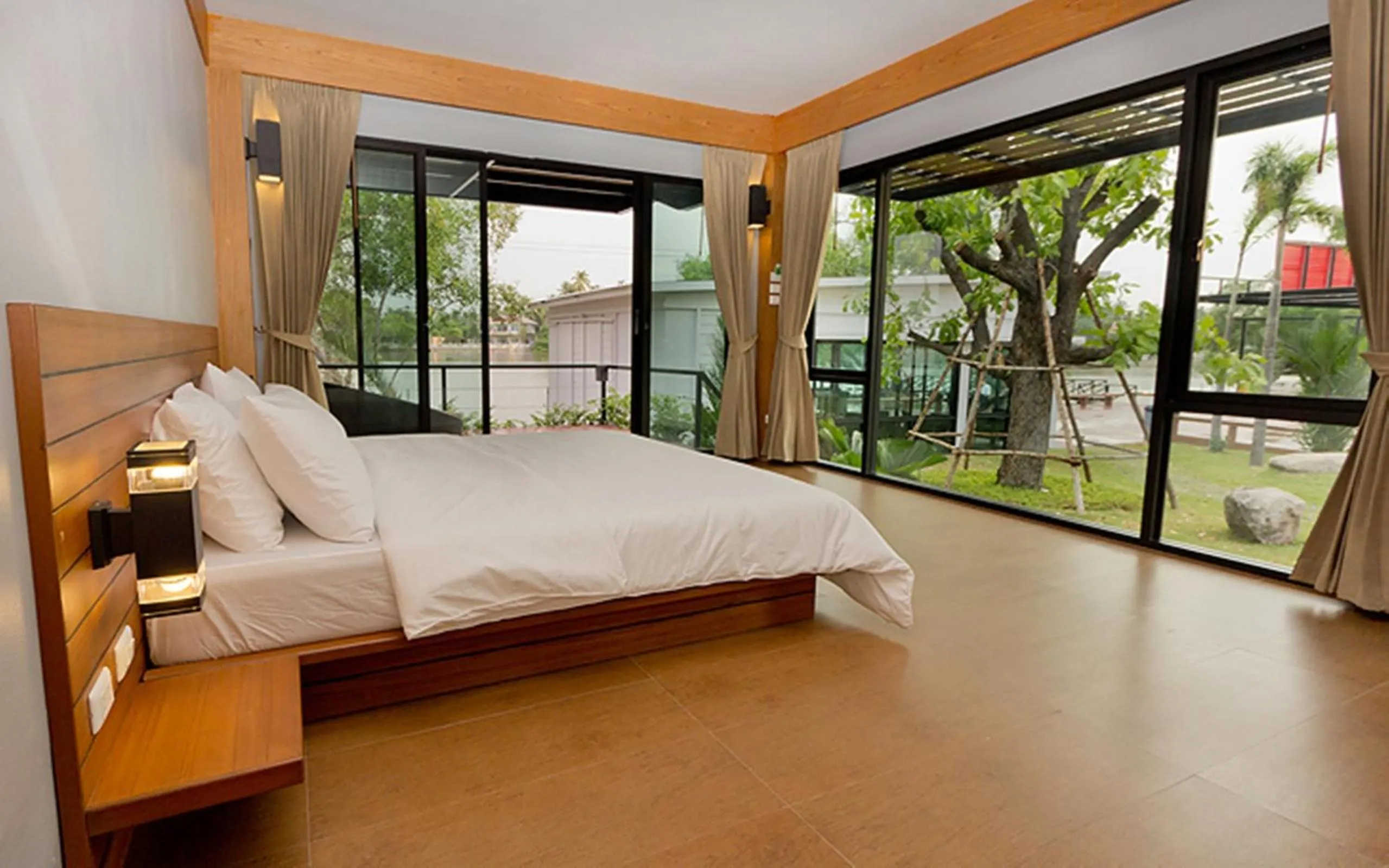 Bed in The Grace Amphawa