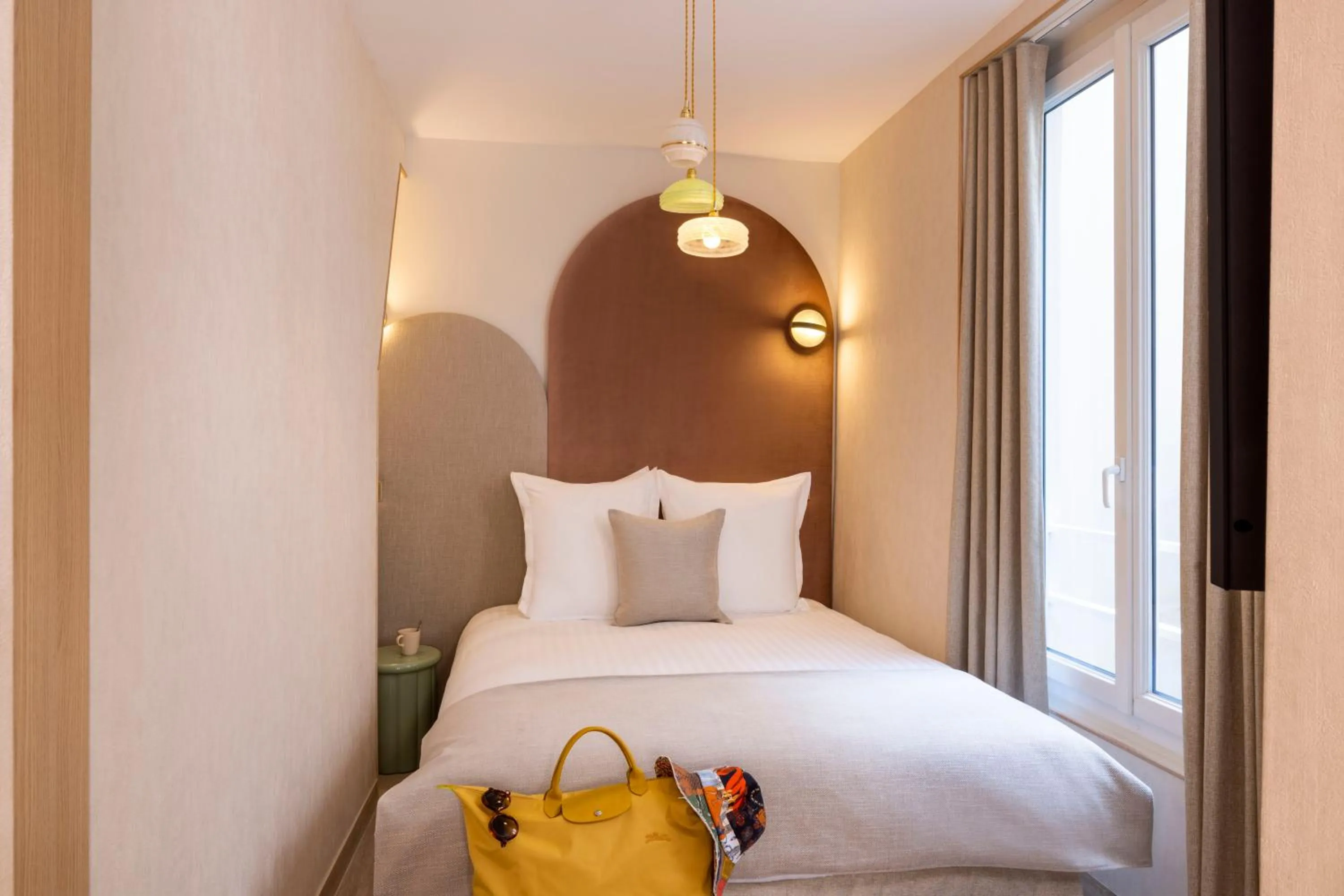 Bedroom, Bed in Yuna Saint-Honoré - Serviced Apartments