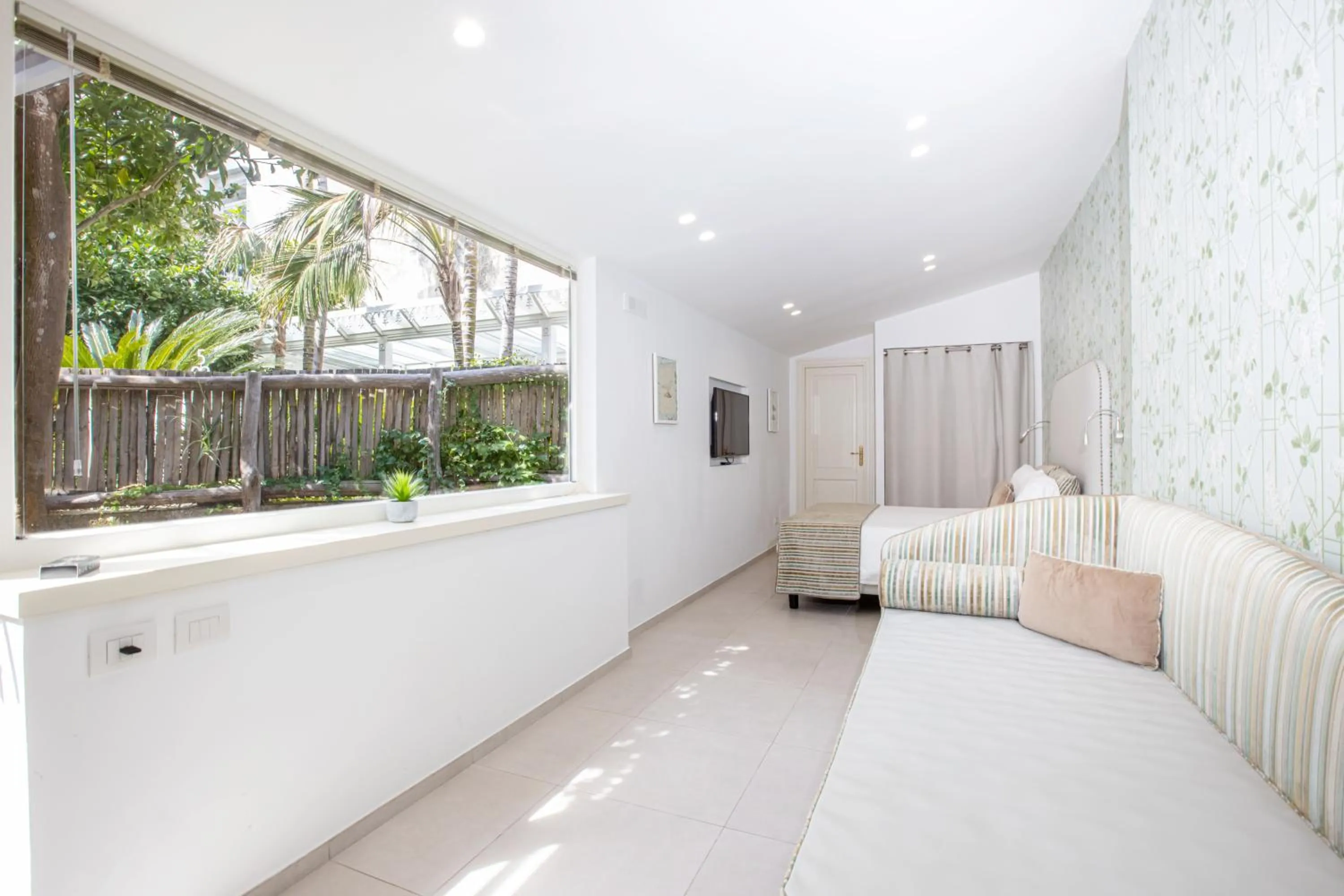 Bedroom in Relais Villa Savarese