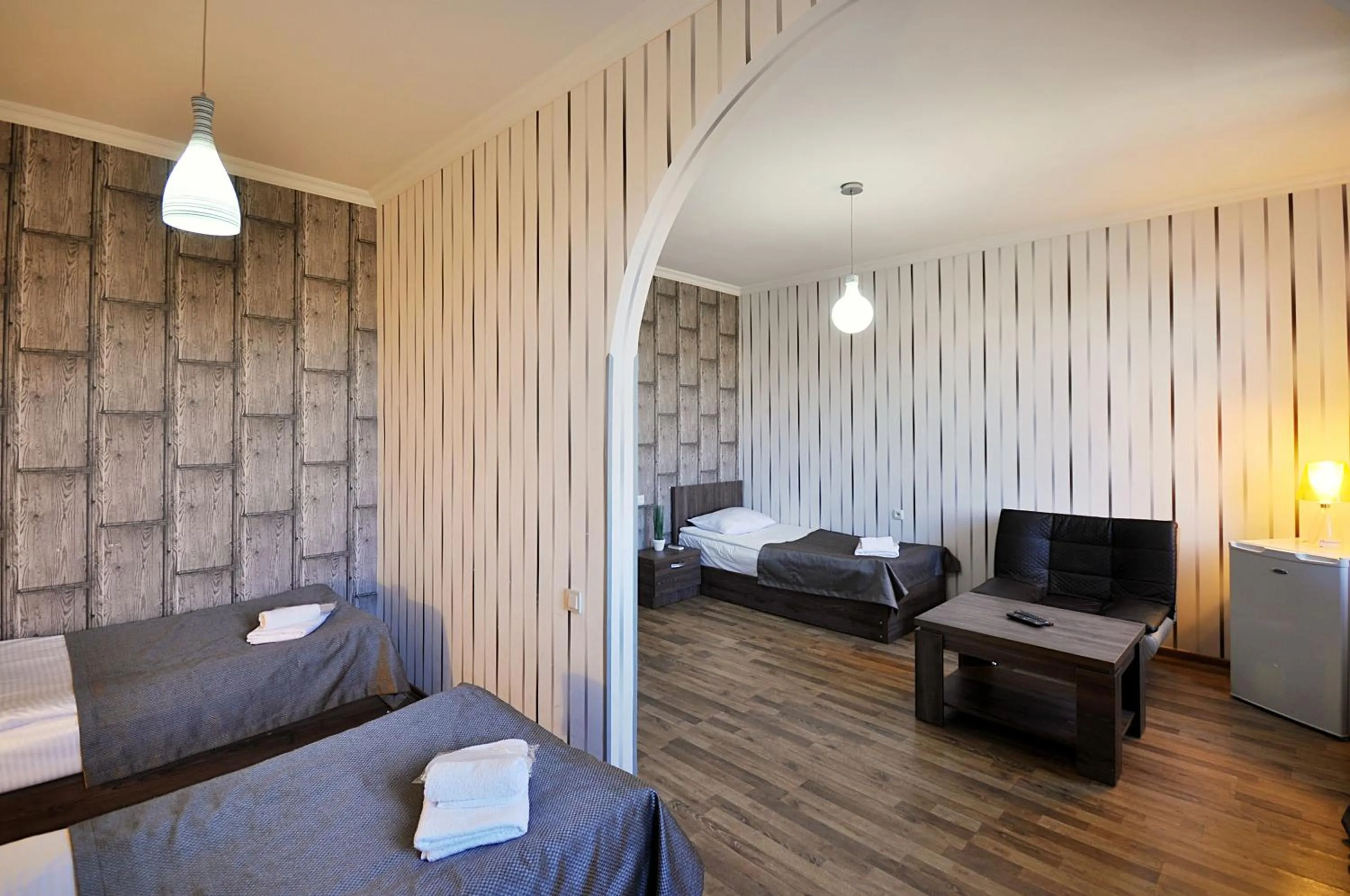 Photo of the whole room, TV/Entertainment Center in Athletics Hotel