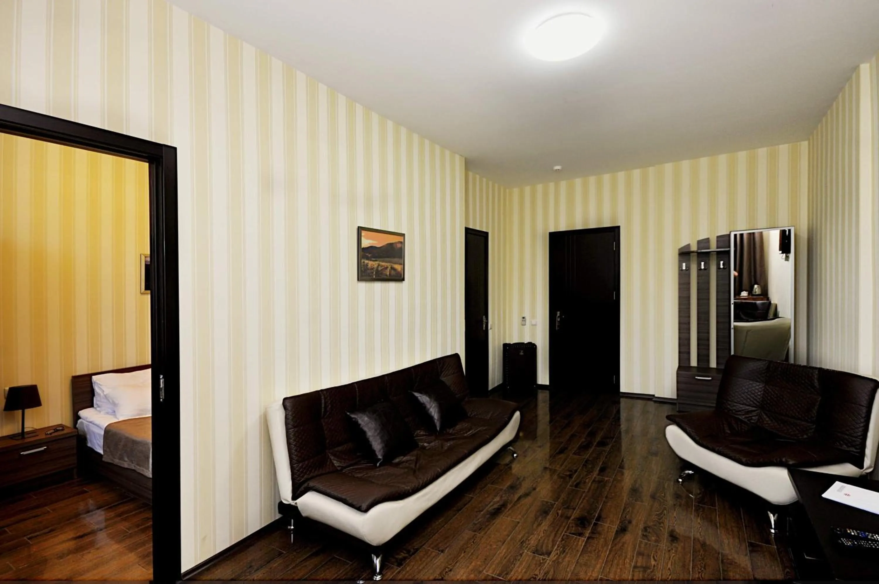 Living room, Seating Area in Athletics Hotel