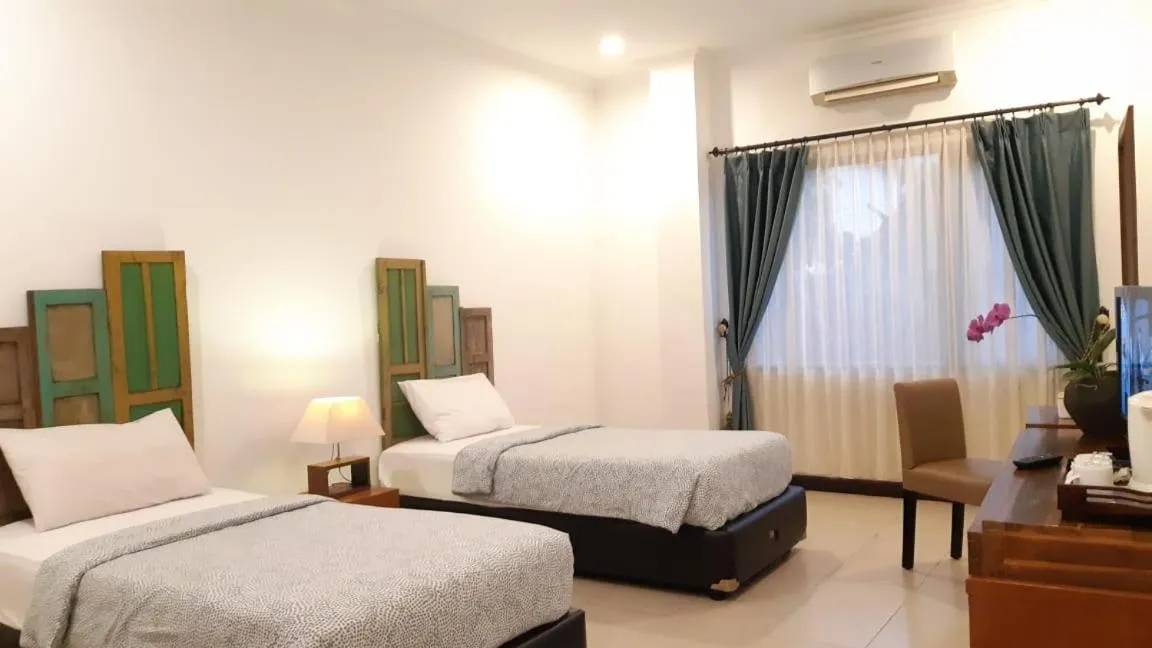 Bed in SARE HOTEL MALIOBORO