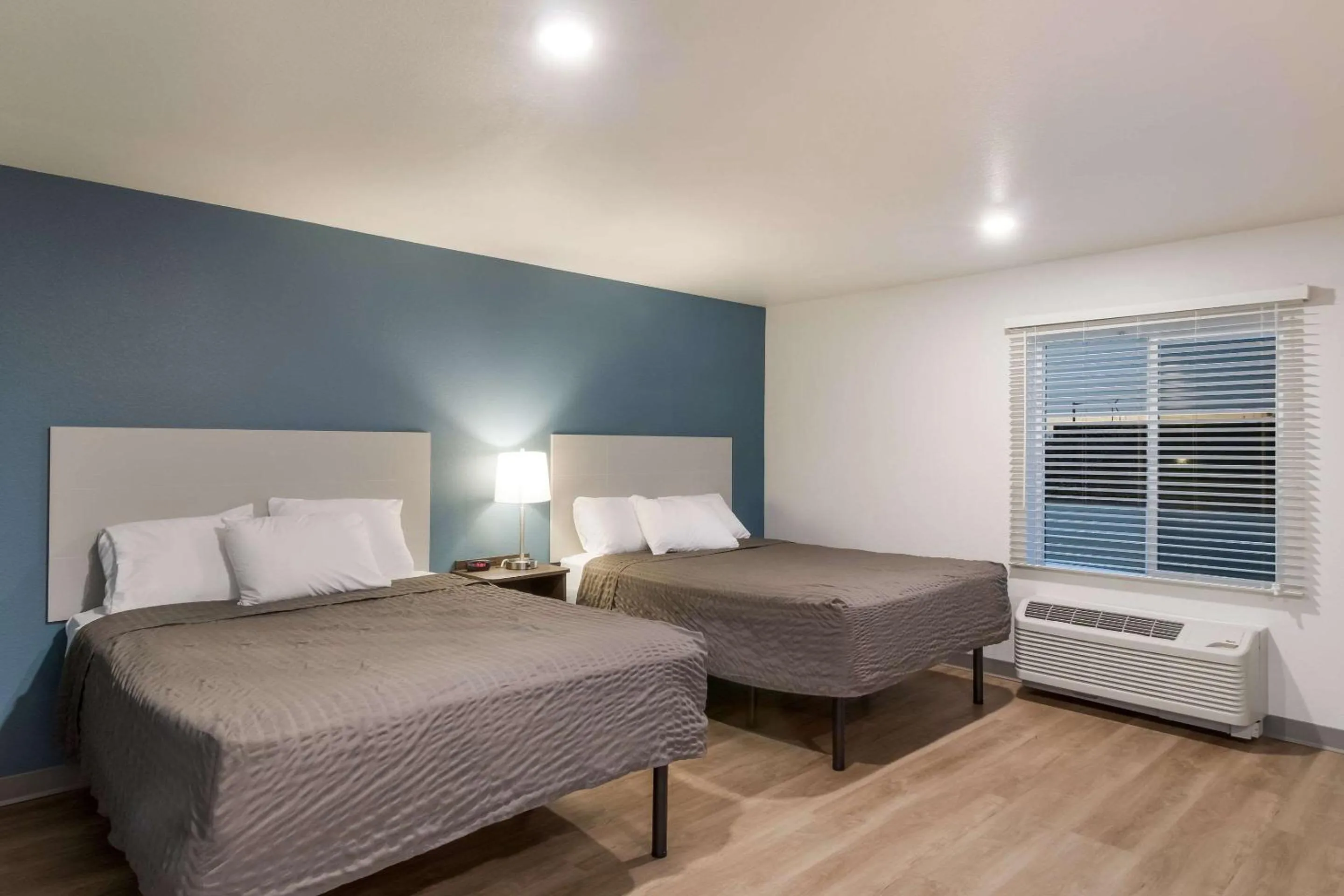 Bedroom, Bed in WoodSpring Suites Mesa Chandler