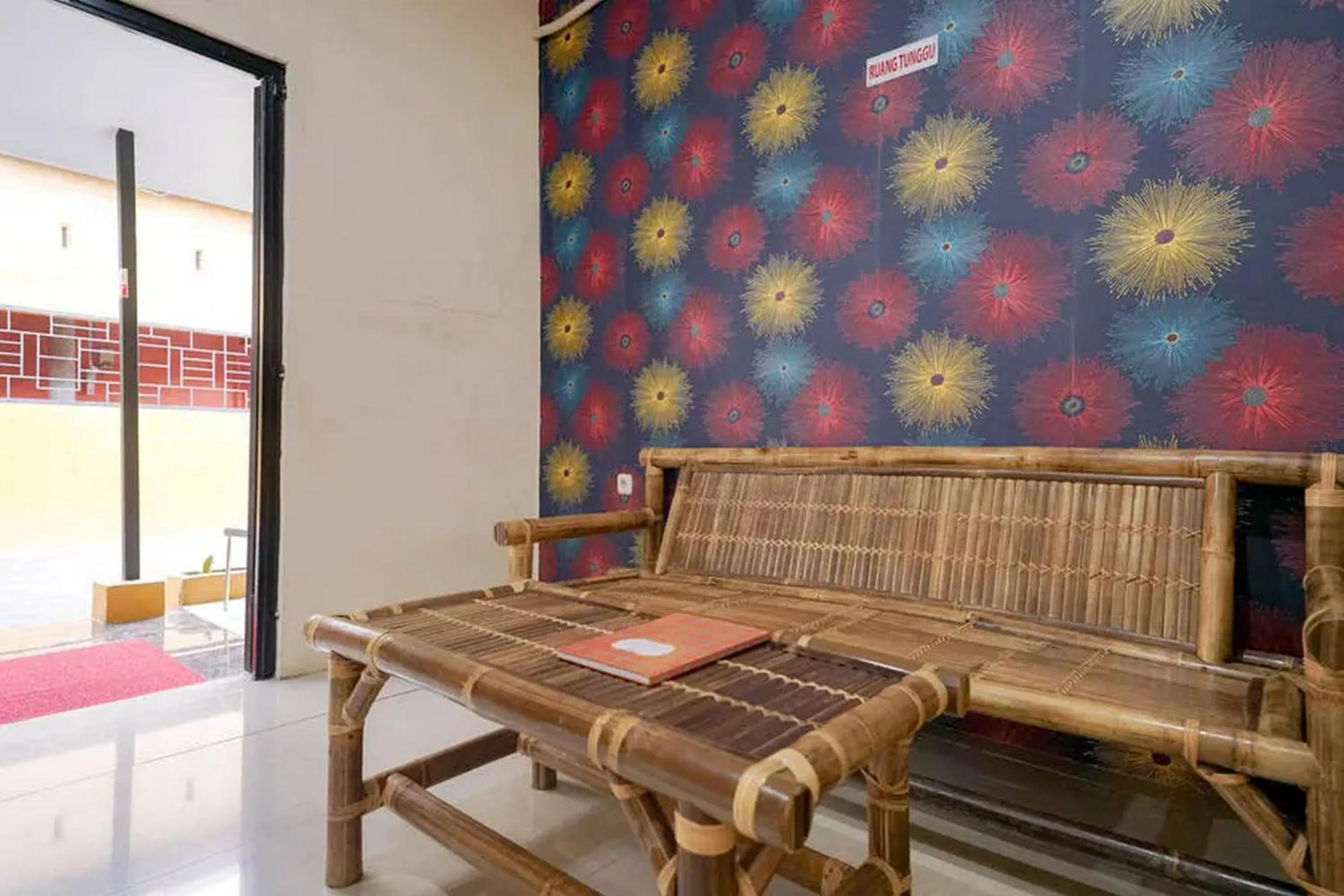 Seating area in RedDoorz near Ekowisata Mangrove Belawan Medan