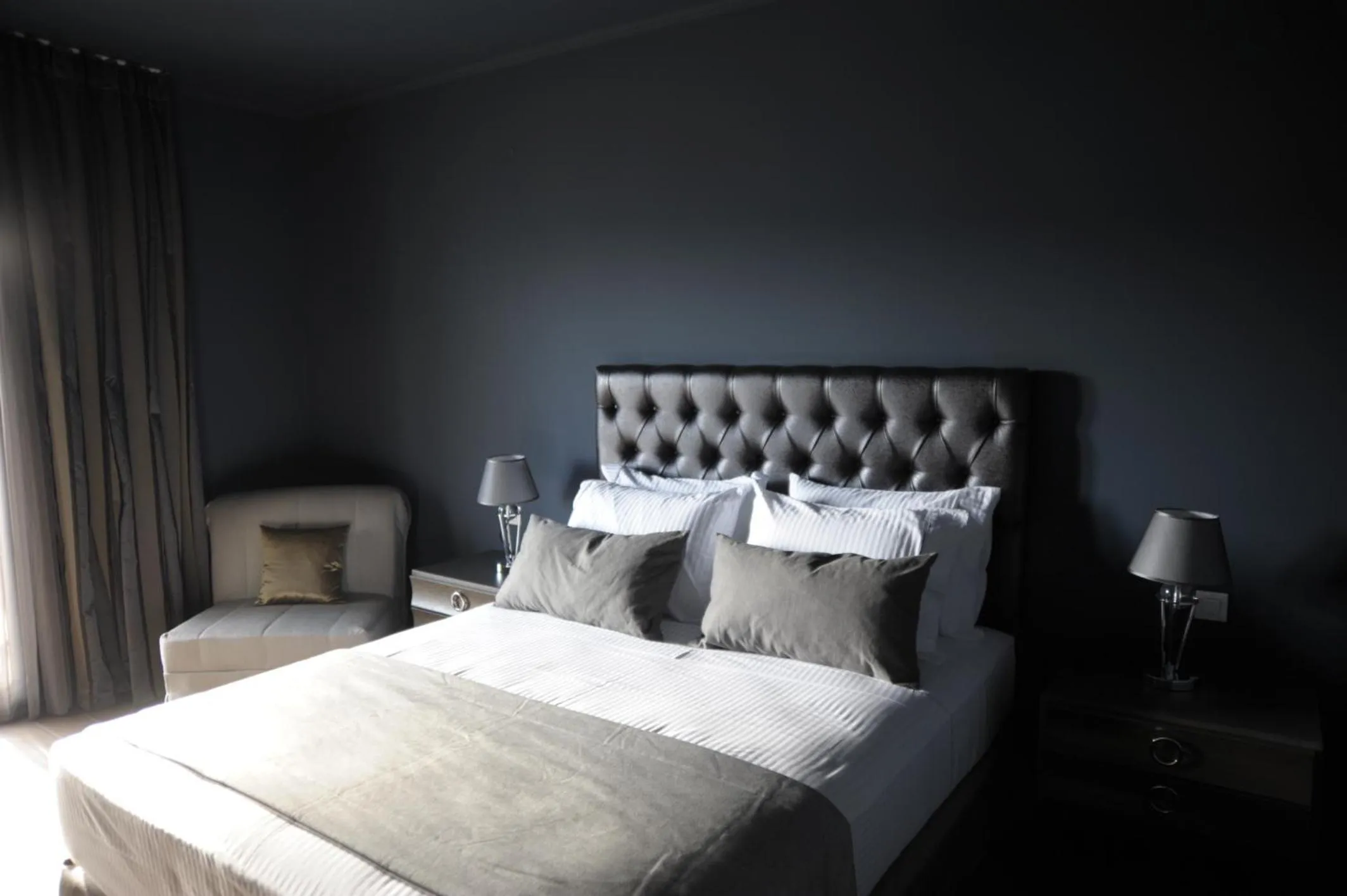 Bed in Theasis Hotel Paramythia