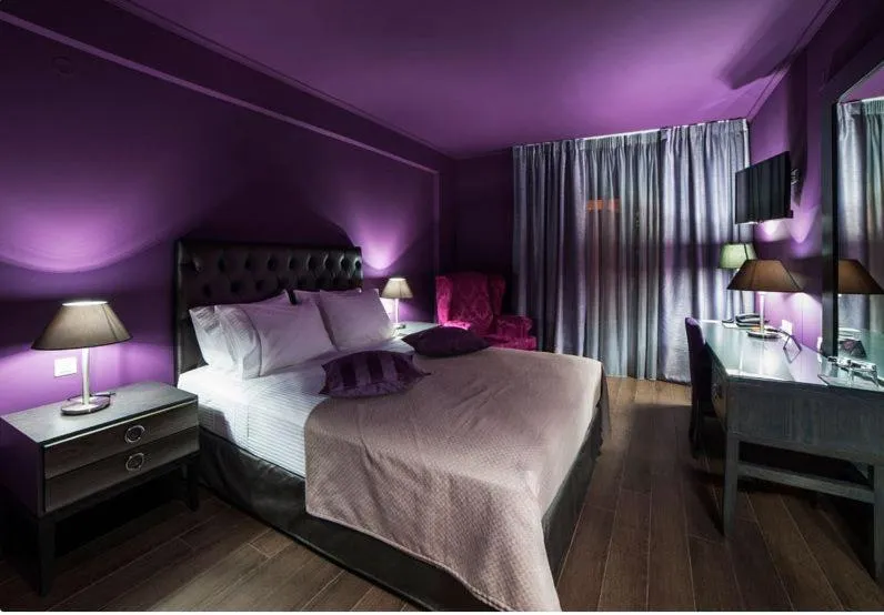 Bed in Theasis Hotel Paramythia