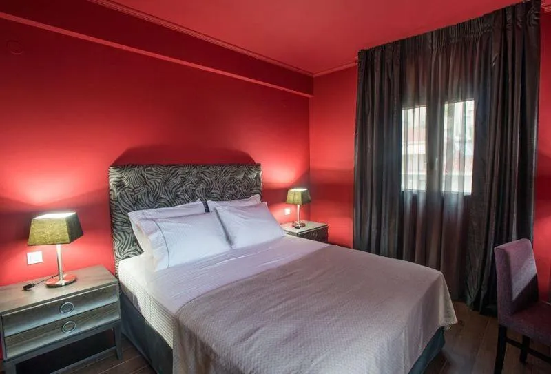 Bed in Theasis Hotel Paramythia