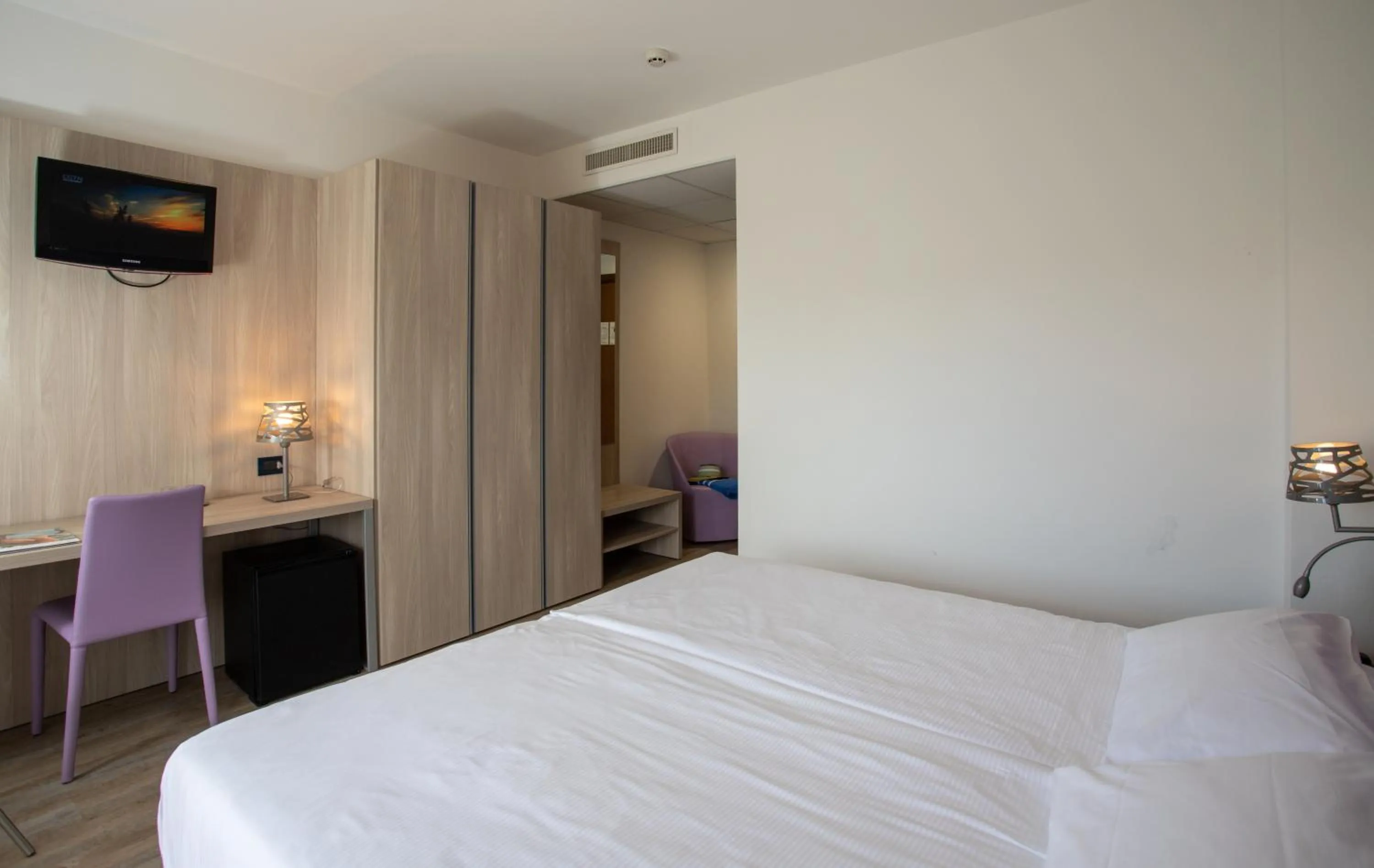 Bed in Fantinello Hotel