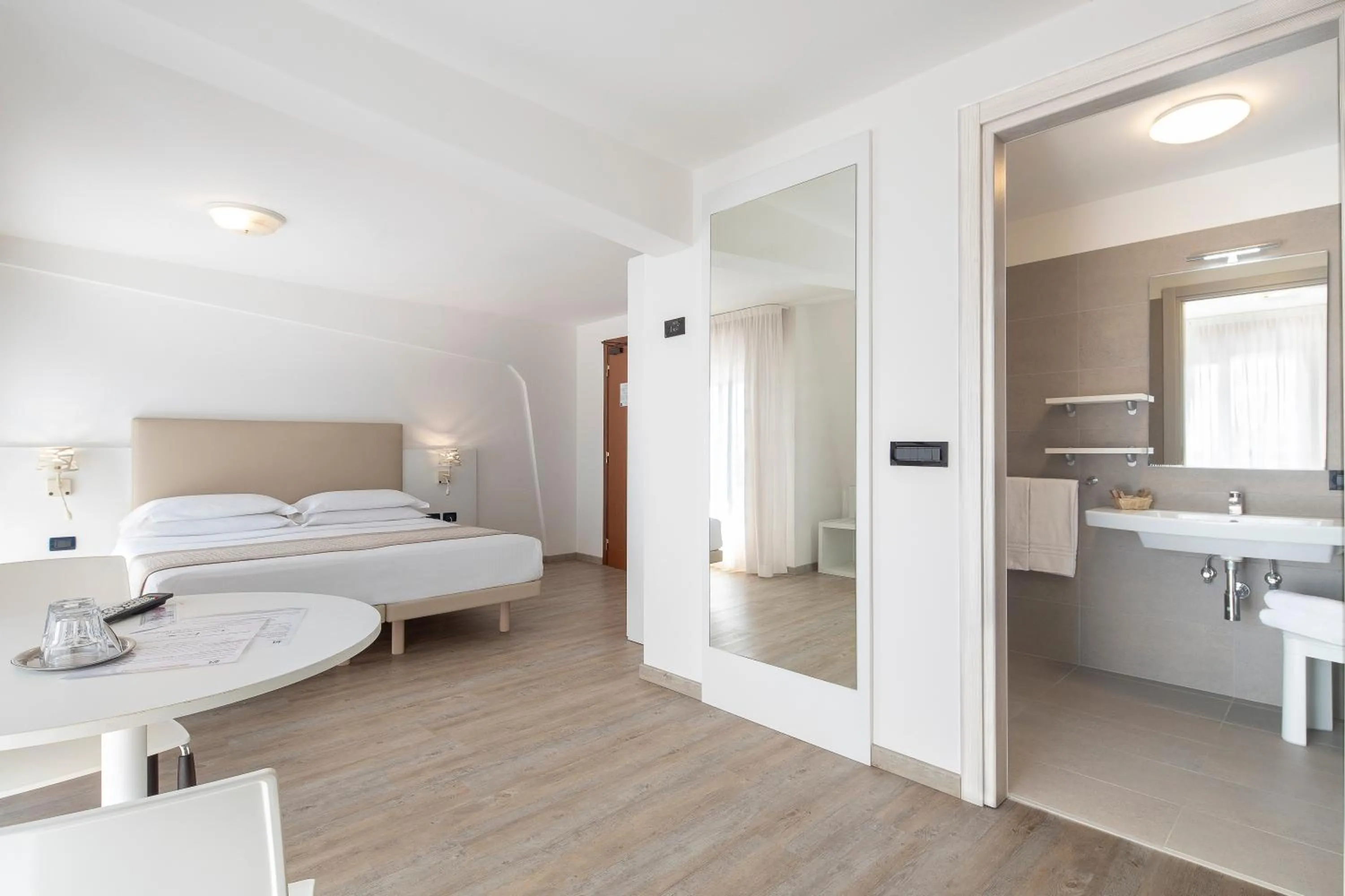 Bed in Fantinello Hotel