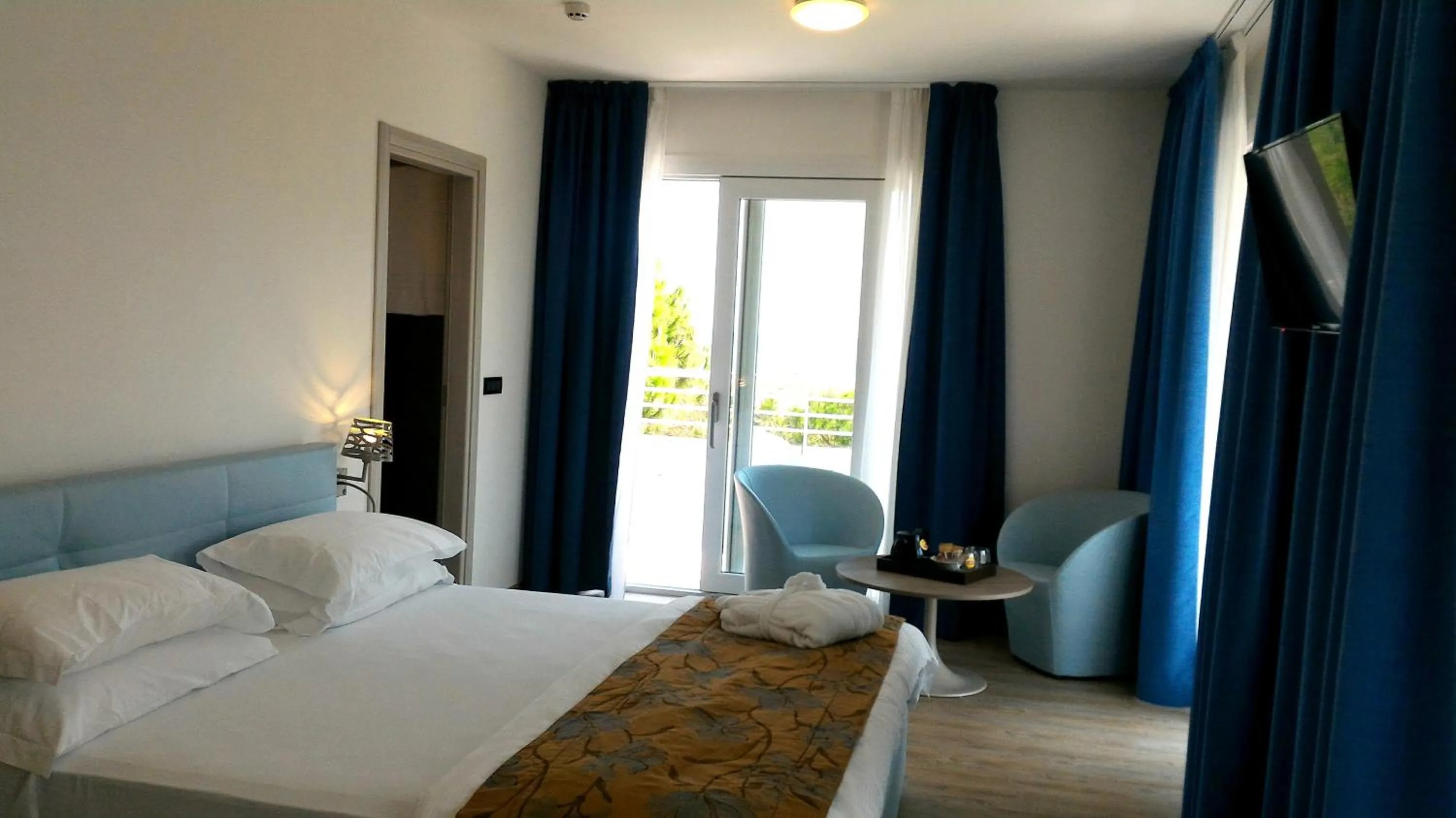 Bed in Fantinello Hotel