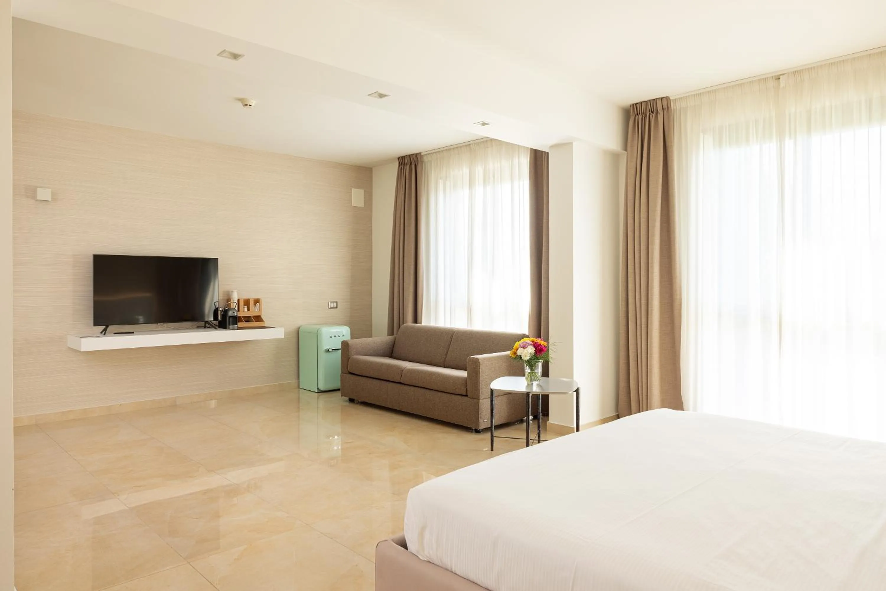 Bed in D'Aragona Lifestyle Hotel