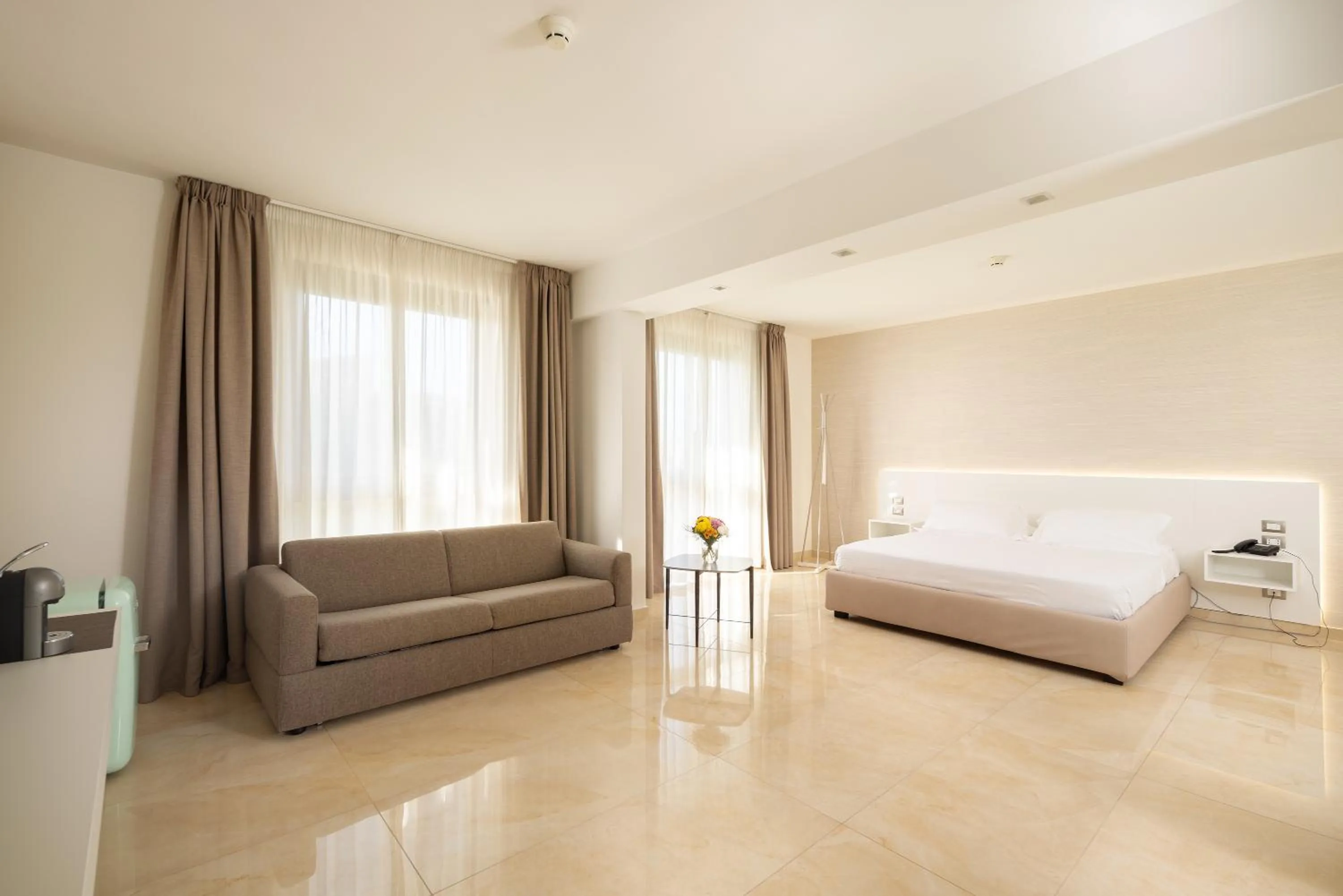 Bed in D'Aragona Lifestyle Hotel