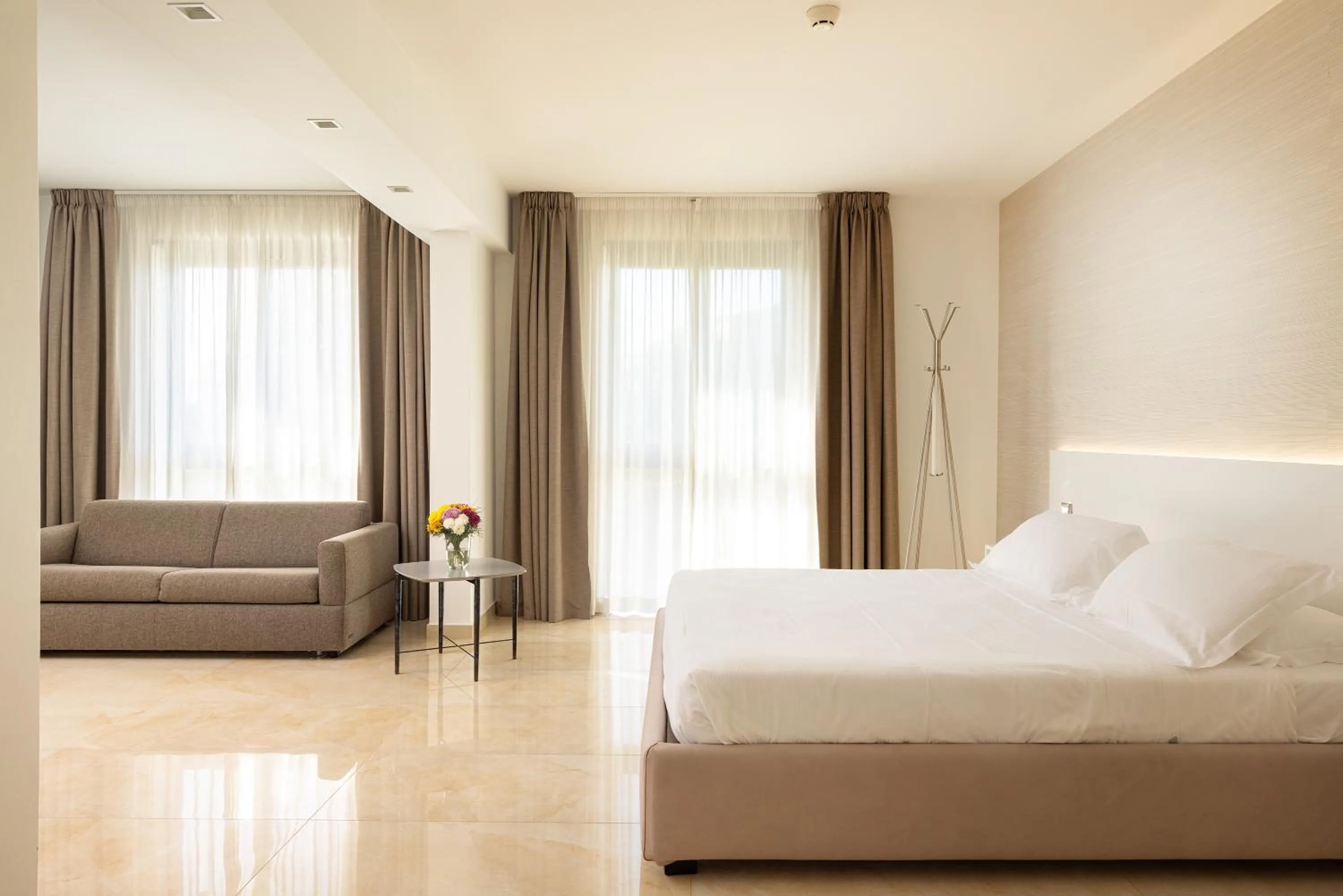 Bed in D'Aragona Lifestyle Hotel