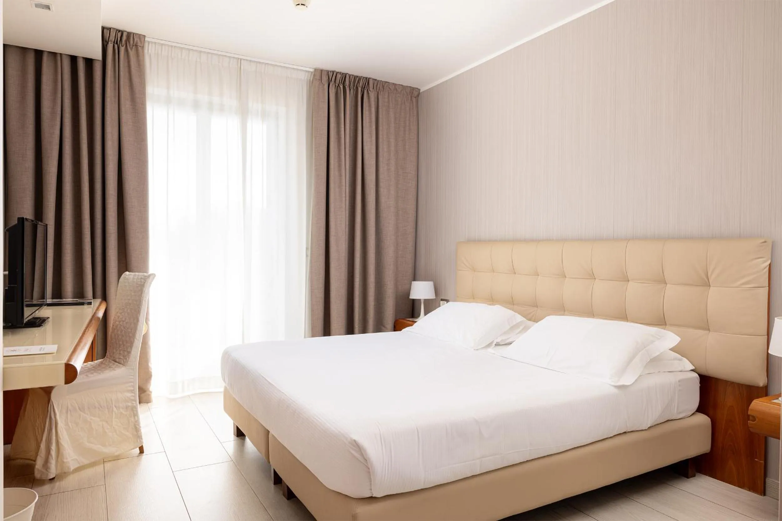 Bed in D'Aragona Lifestyle Hotel