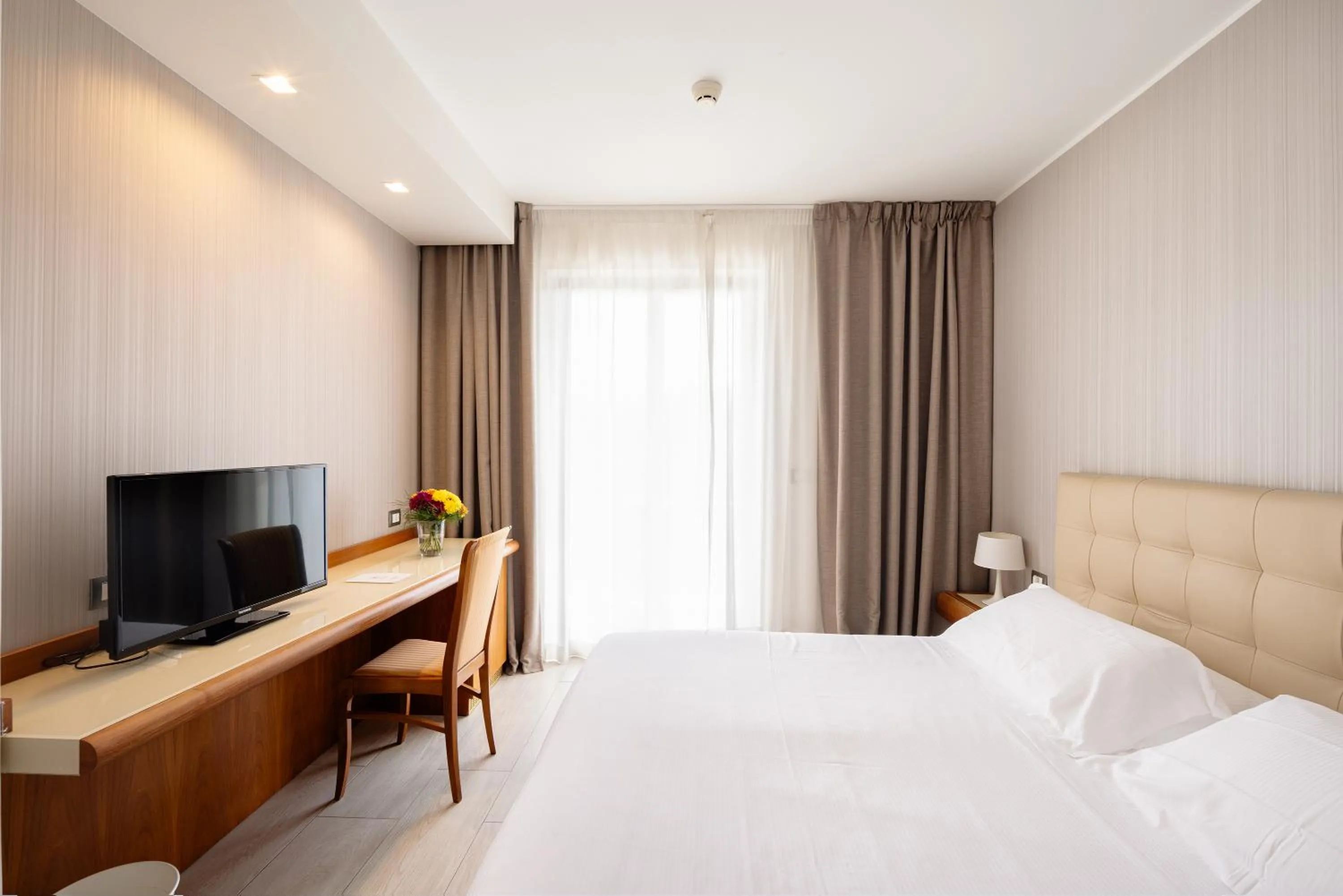 Bed in D'Aragona Lifestyle Hotel