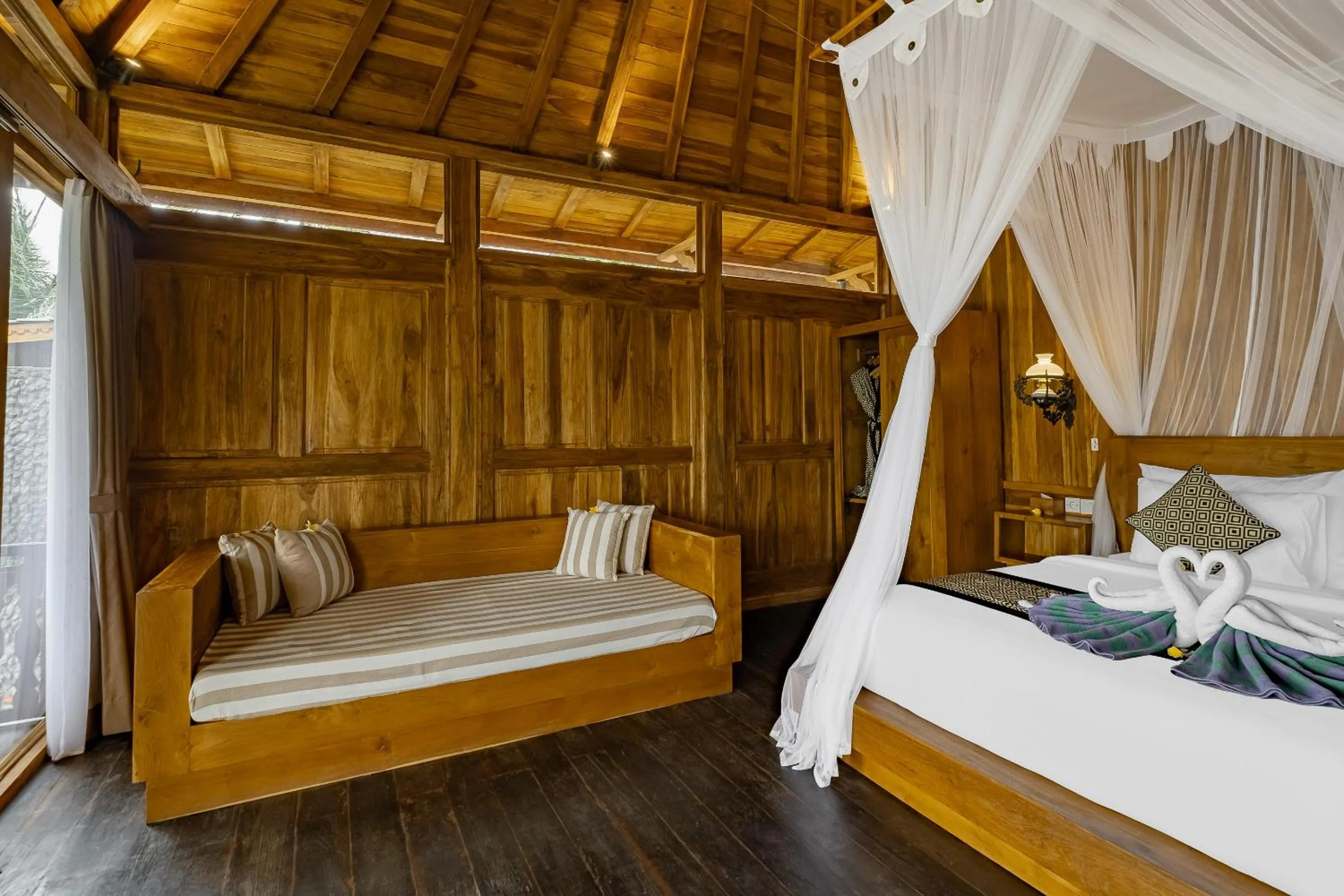Bed in Anandari Ubud Villa