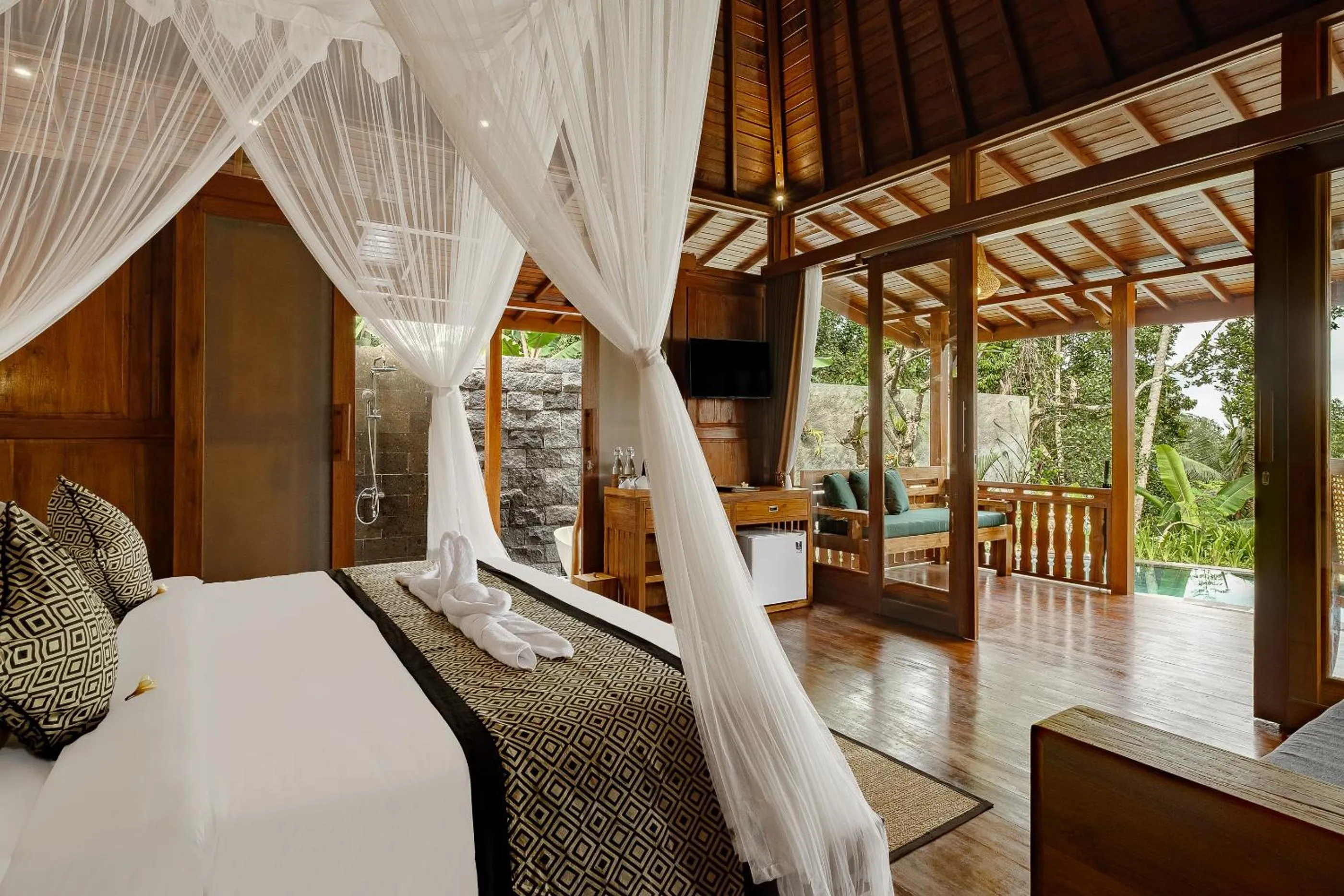 Bed in Anandari Ubud Villa