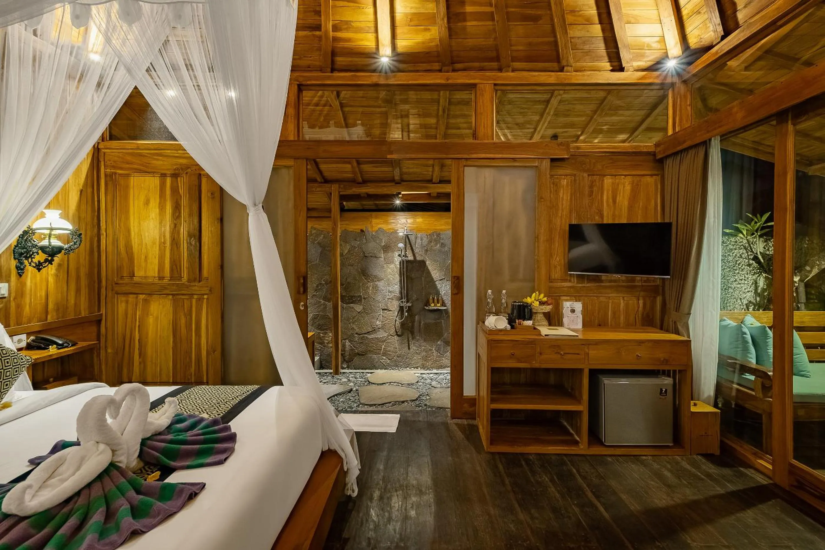 Bed in Anandari Ubud Villa