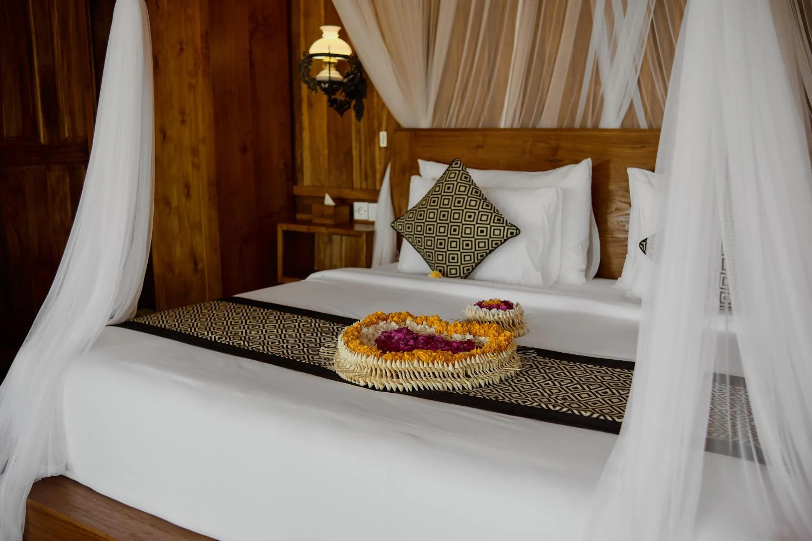 Bed in Anandari Ubud Villa