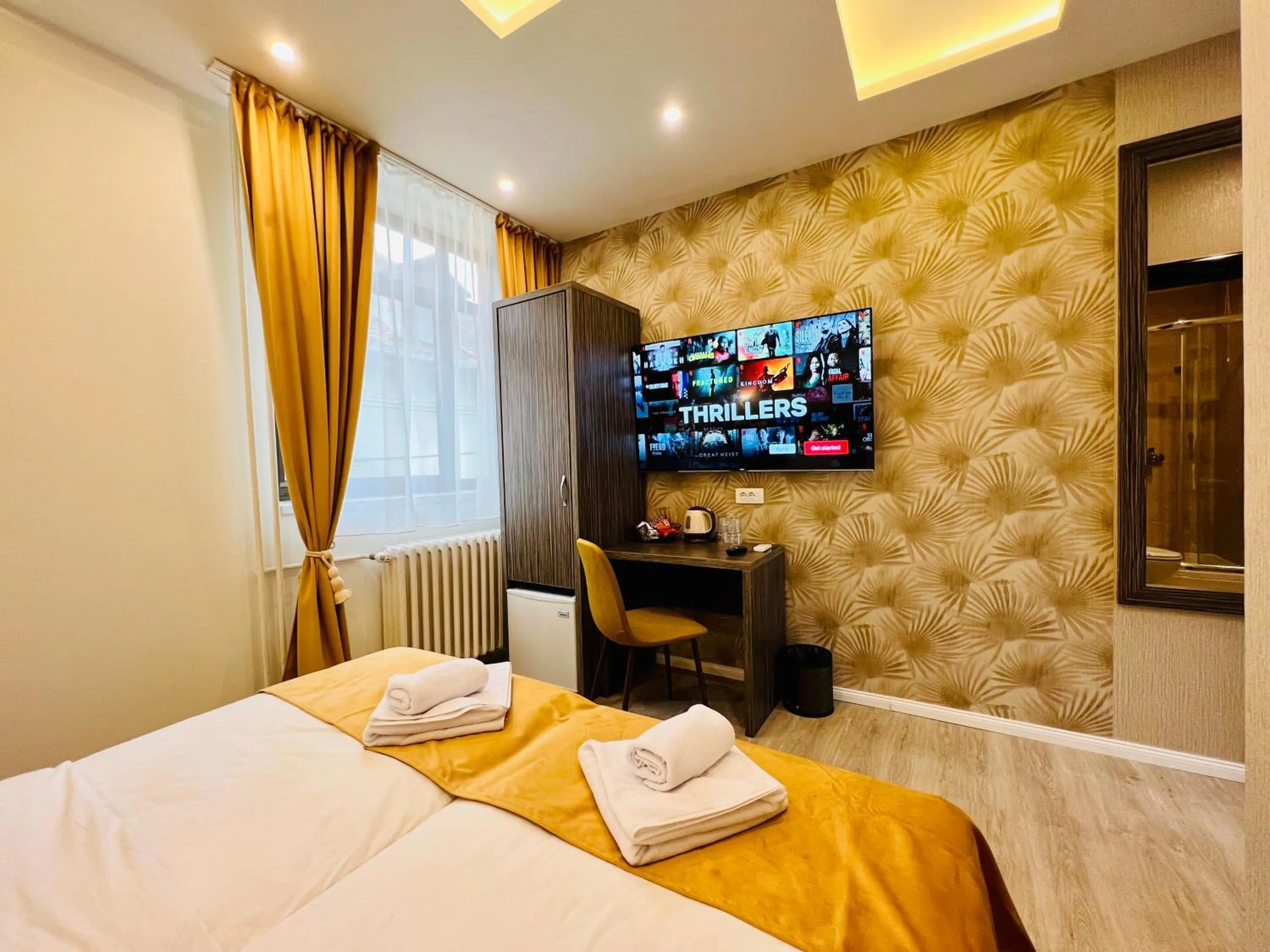 Bed in Side One Design Hotel Garni