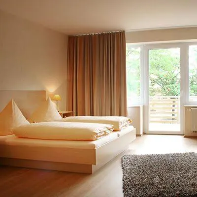 Bedroom, Bed in Bernsteinsee Hotel&Ferien