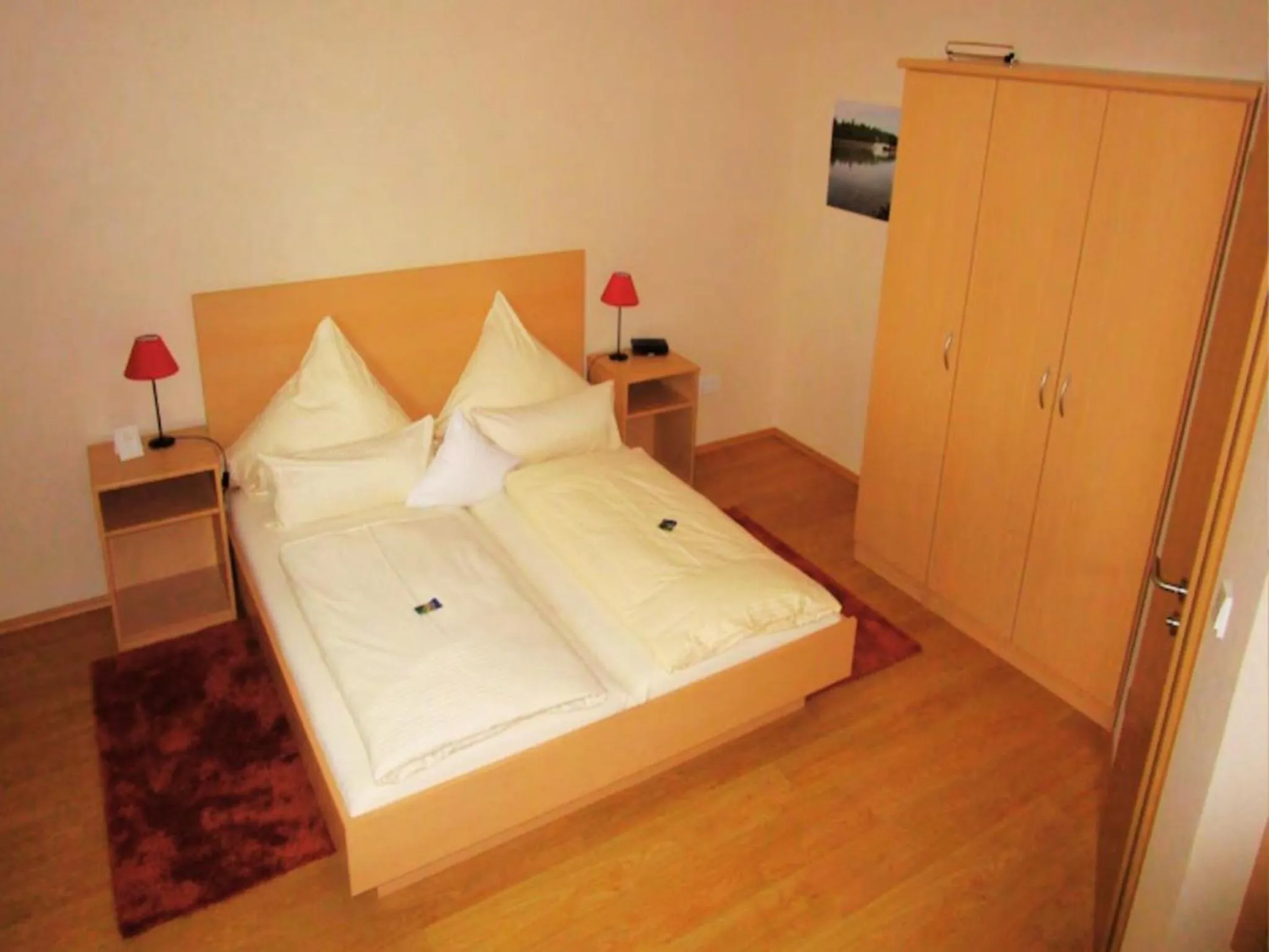 Bedroom, Bed in Bernsteinsee Hotel&Ferien