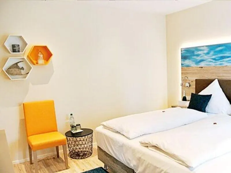 Bedroom, Bed in Bernsteinsee Hotel&Ferien