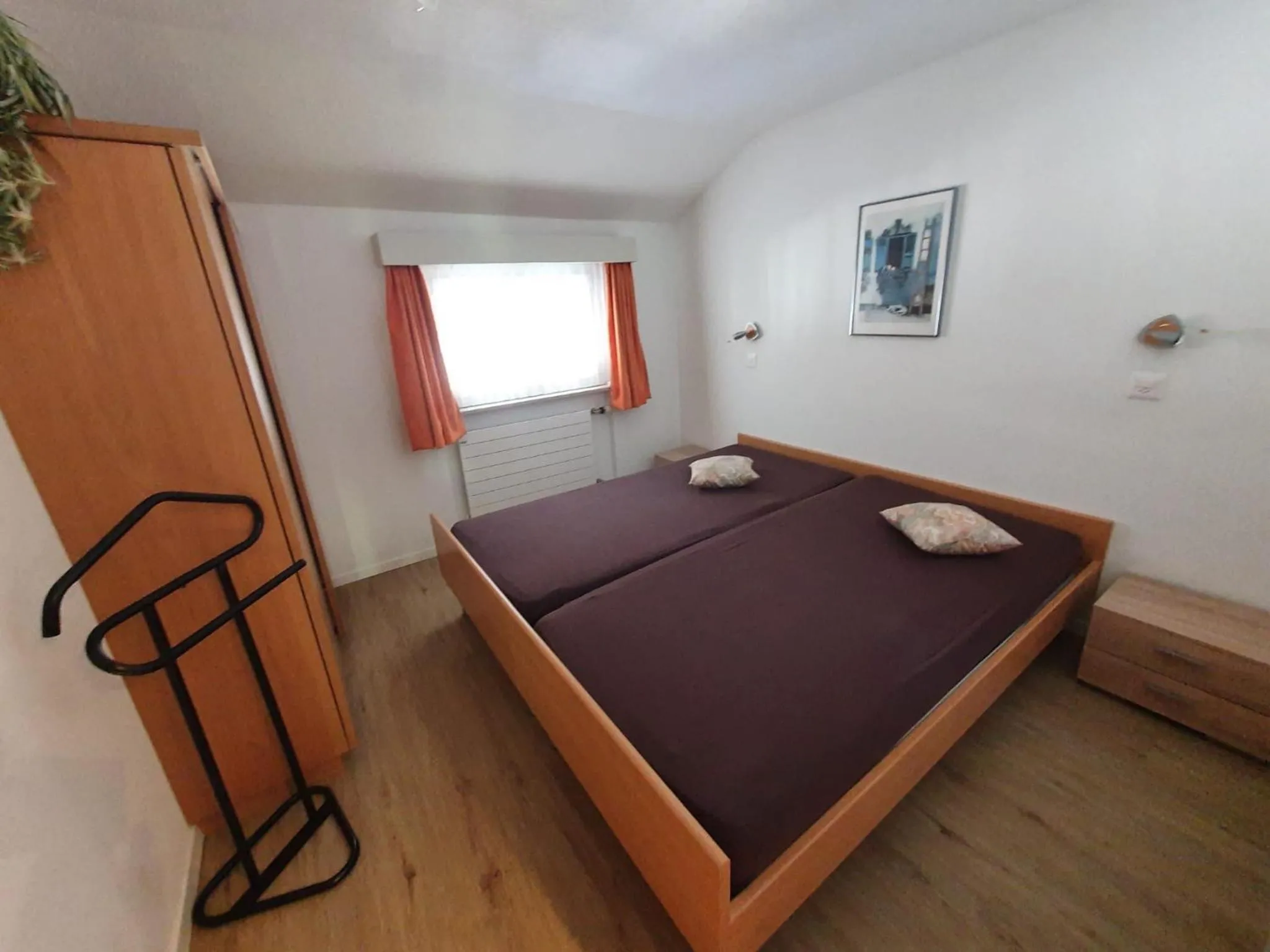 Bed in Apartmenthaus Holiday