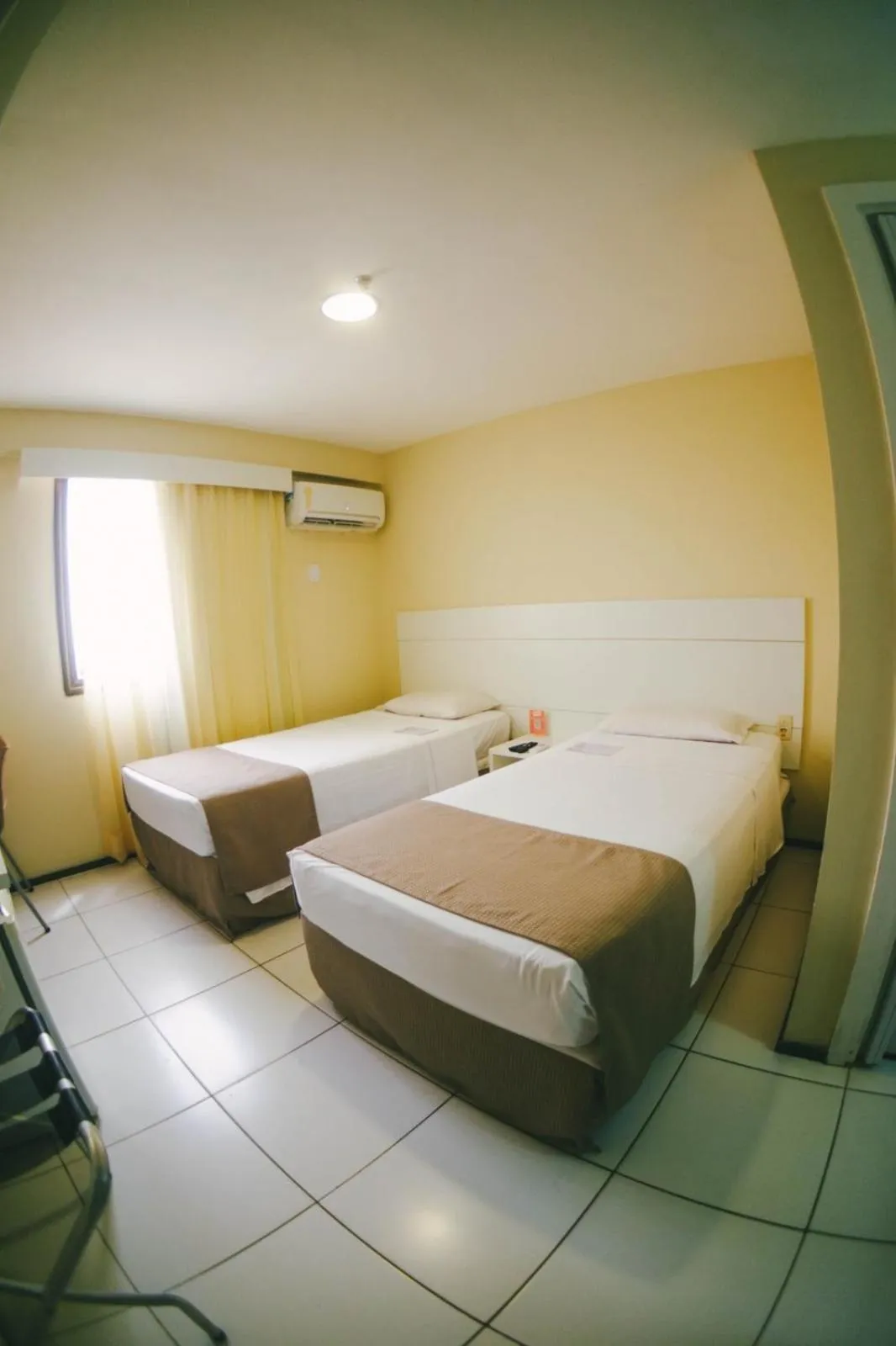 Bed in Soft Win Hotel São Luís