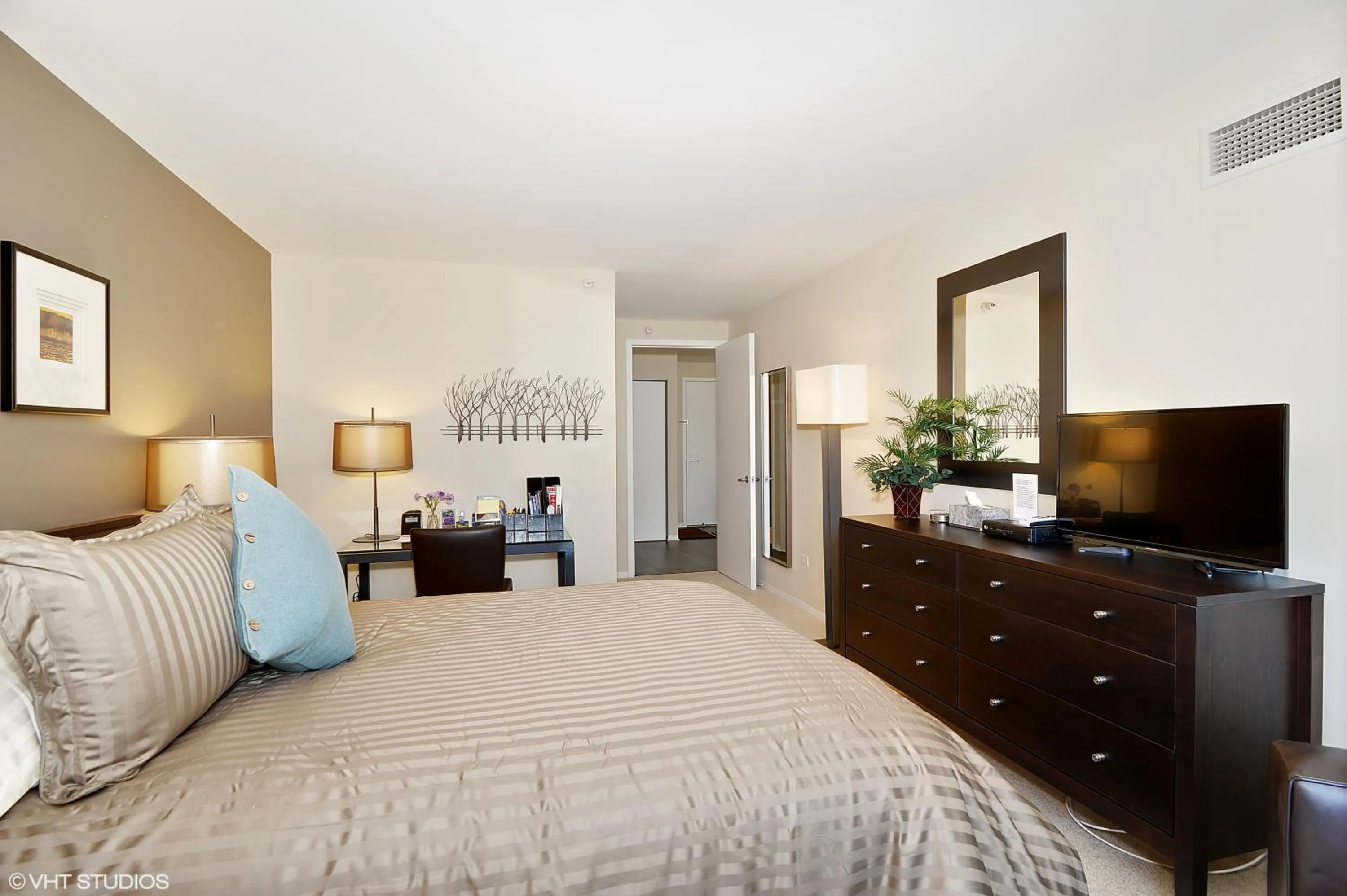 Bed in The Penthouse at Grand Plaza