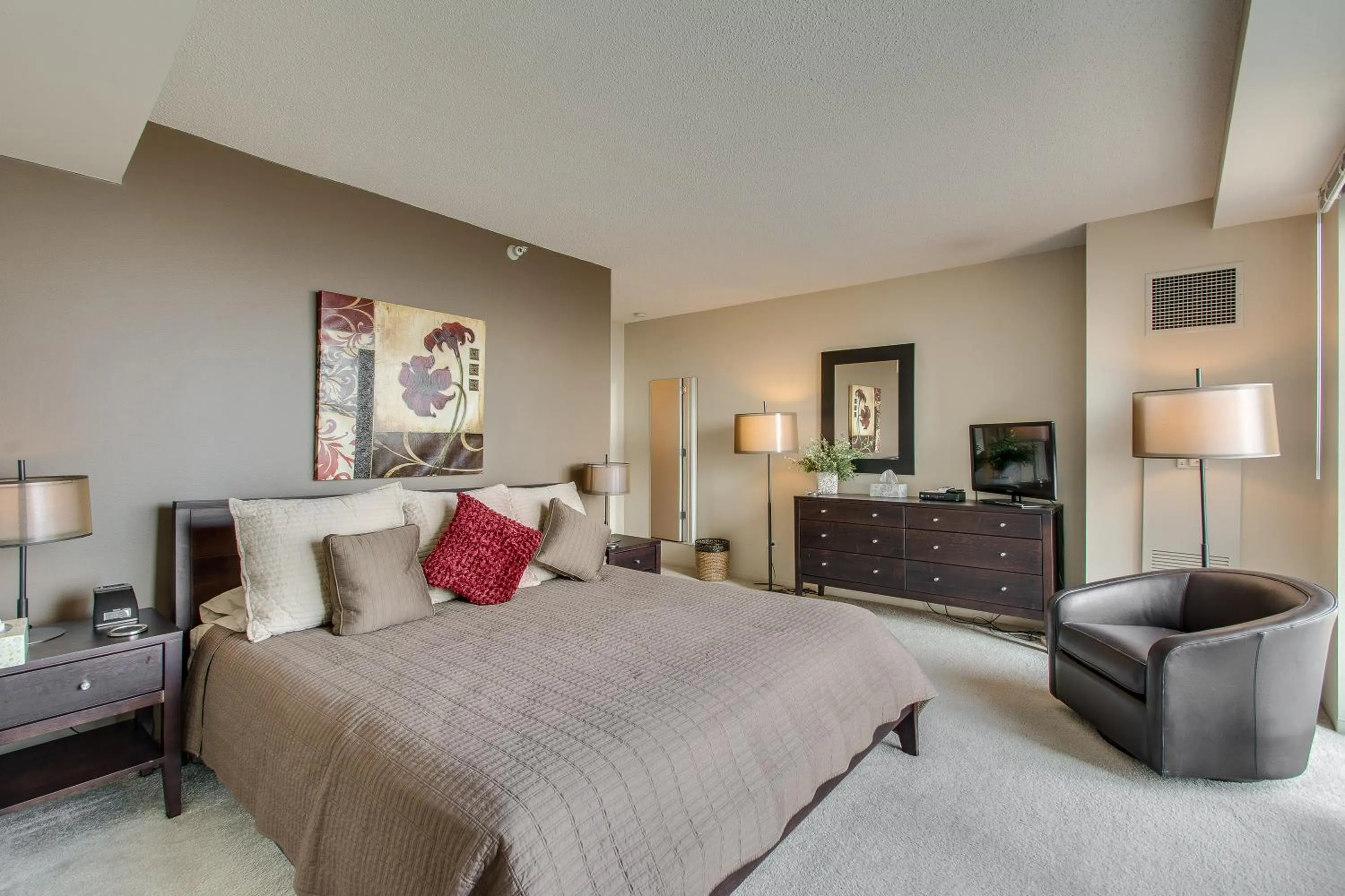 Bed in The Penthouse at Grand Plaza