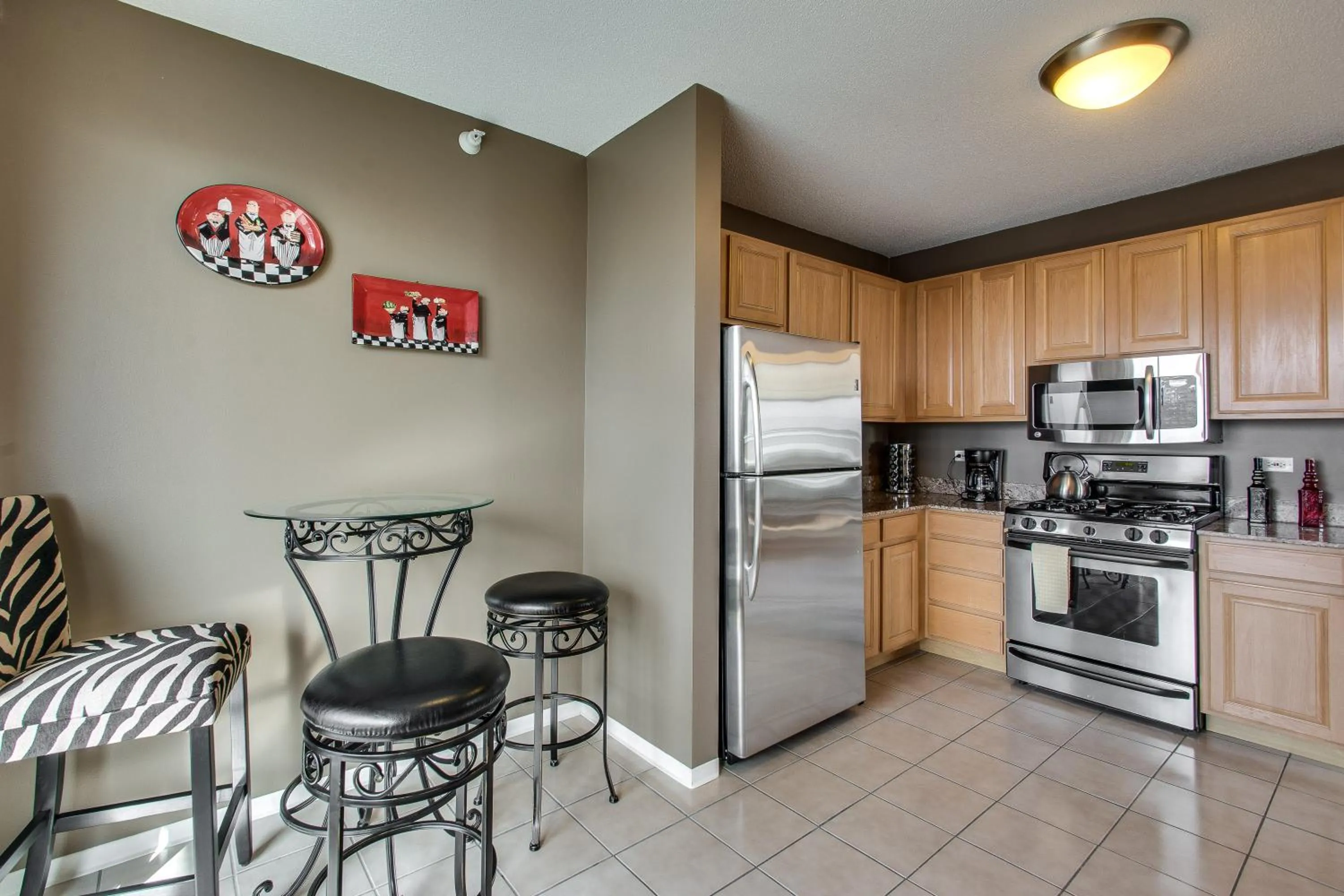 Kitchen or kitchenette in The Penthouse at Grand Plaza