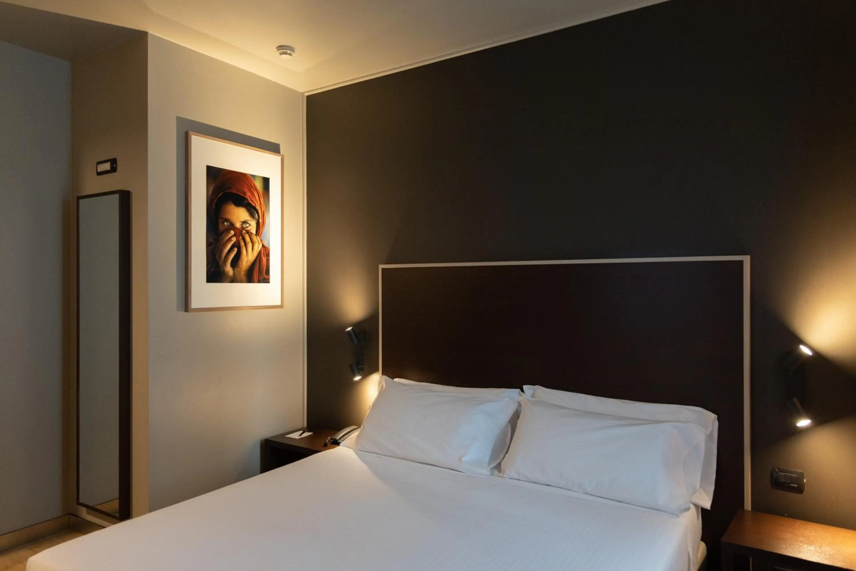 Bed in Art Hotel Olympic