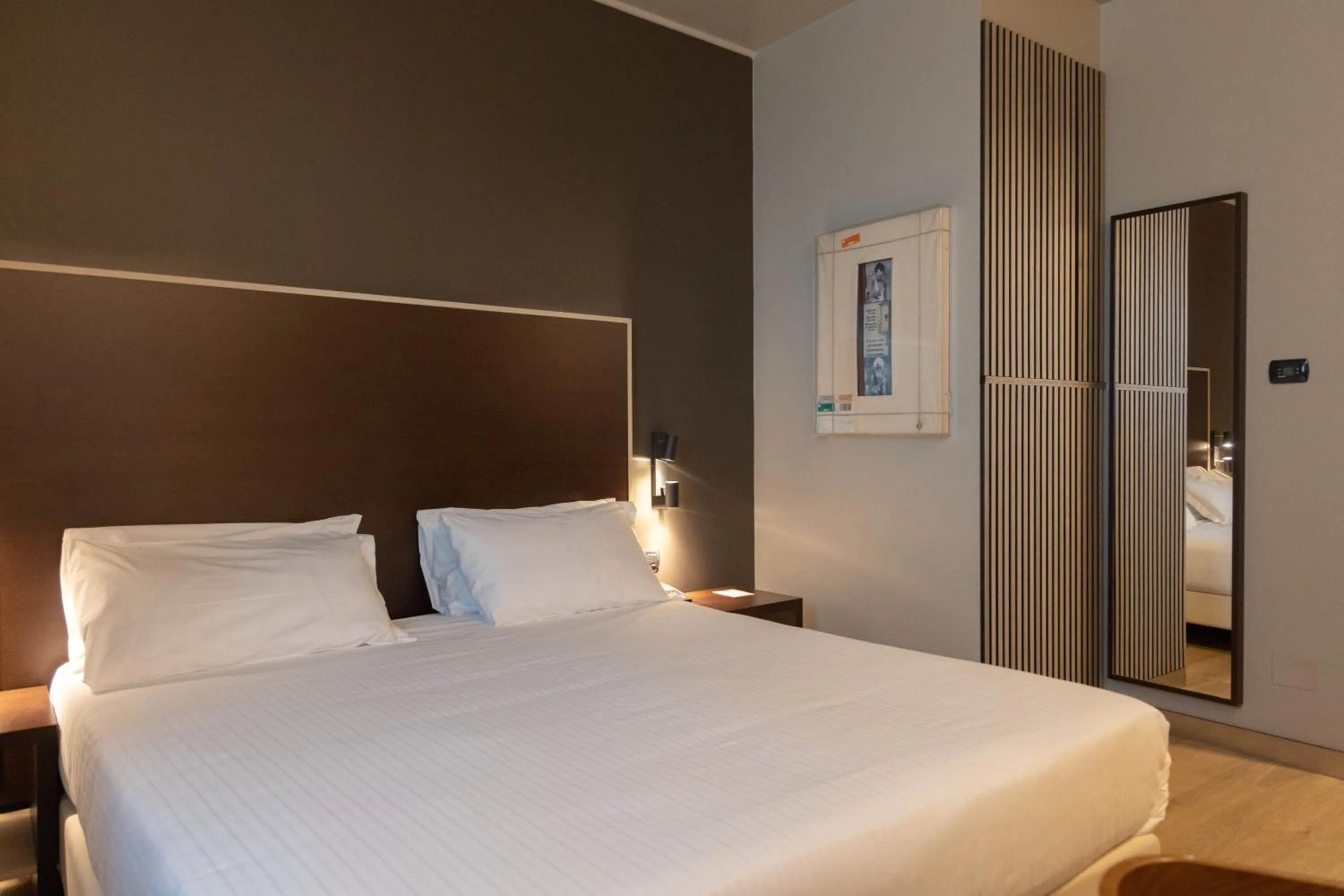 Bed in Art Hotel Olympic