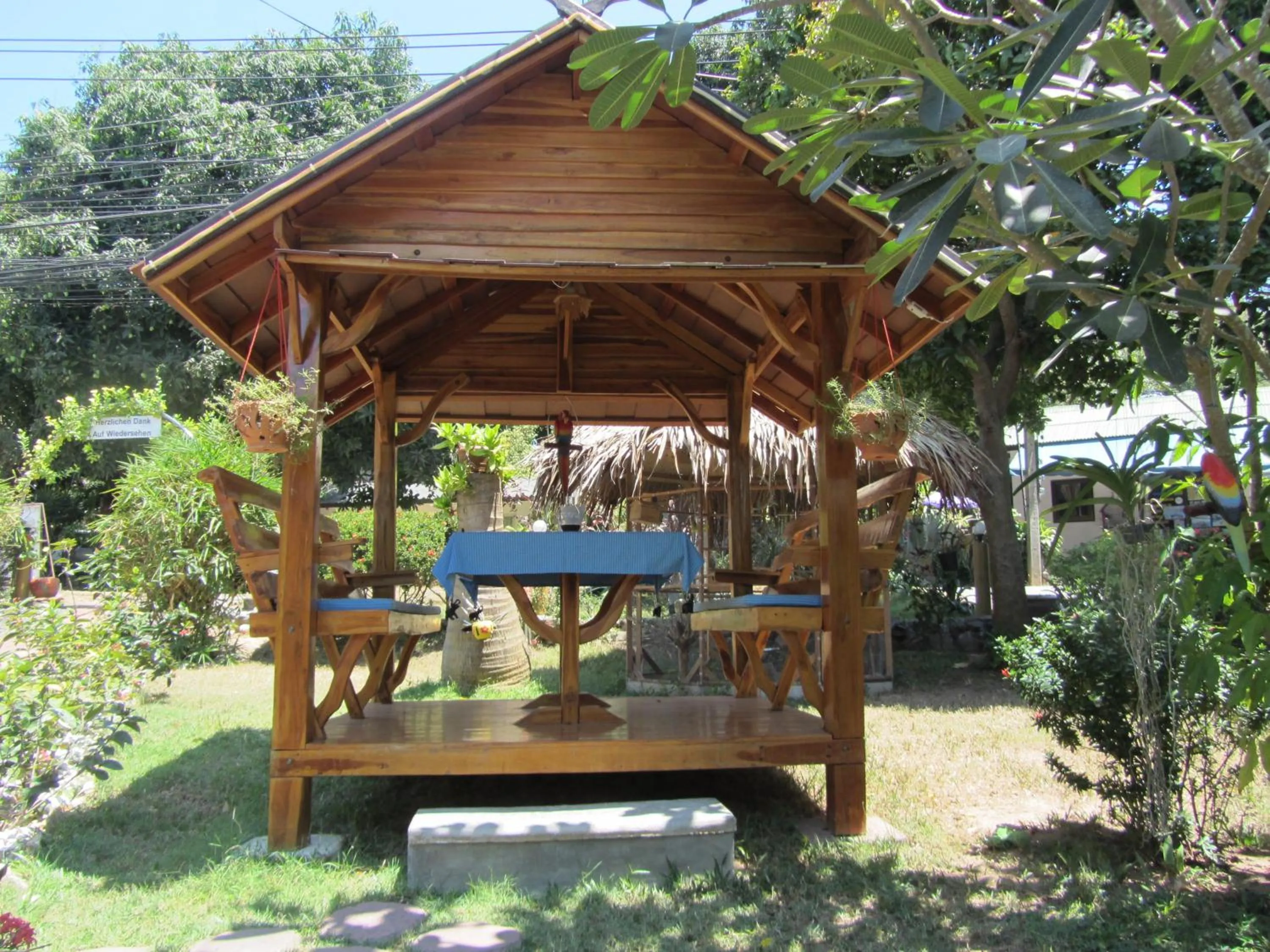 Facade/entrance in Flower Paradise Bungalows & Swiss Restaurant Roestiland