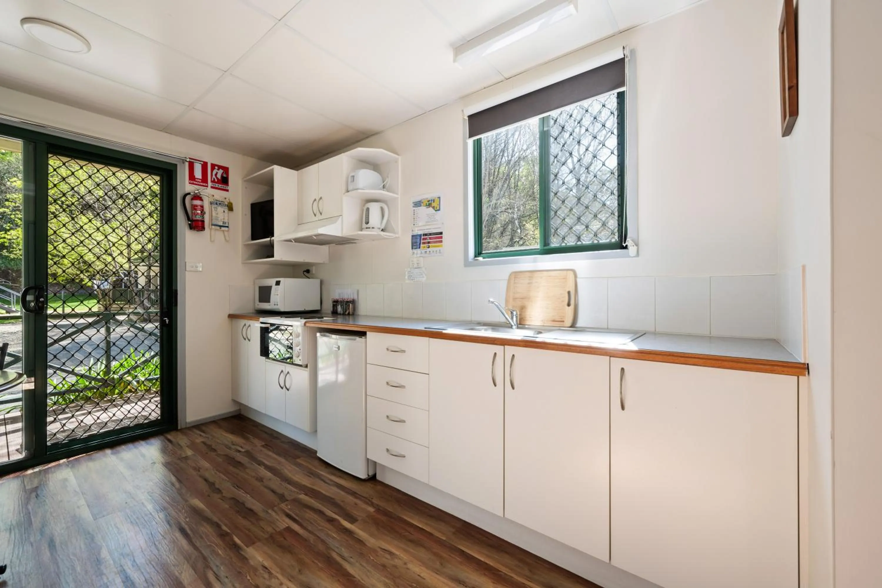 Kitchen or kitchenette in Bright Accommodation Park