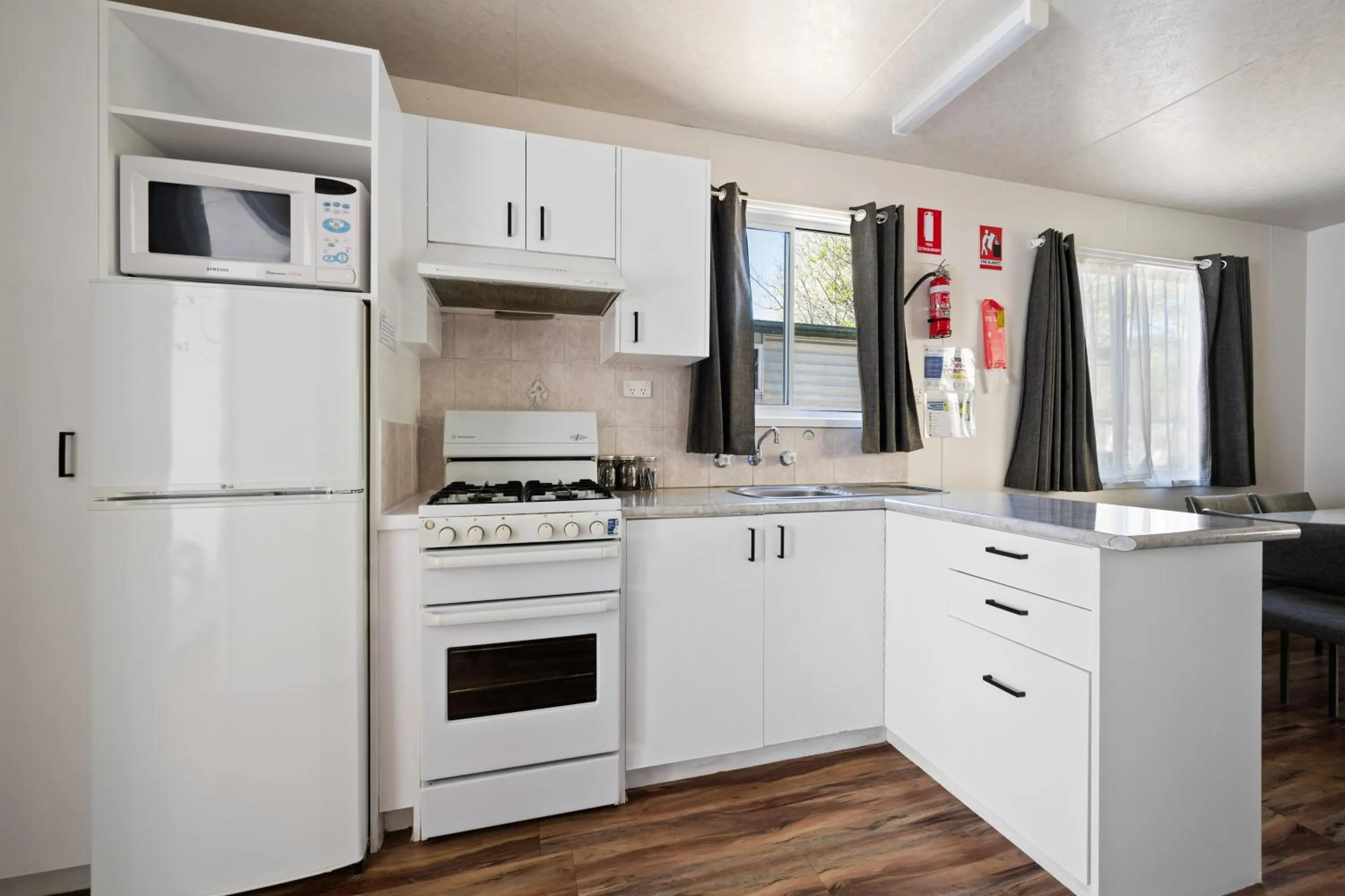 Kitchen or kitchenette in Bright Accommodation Park