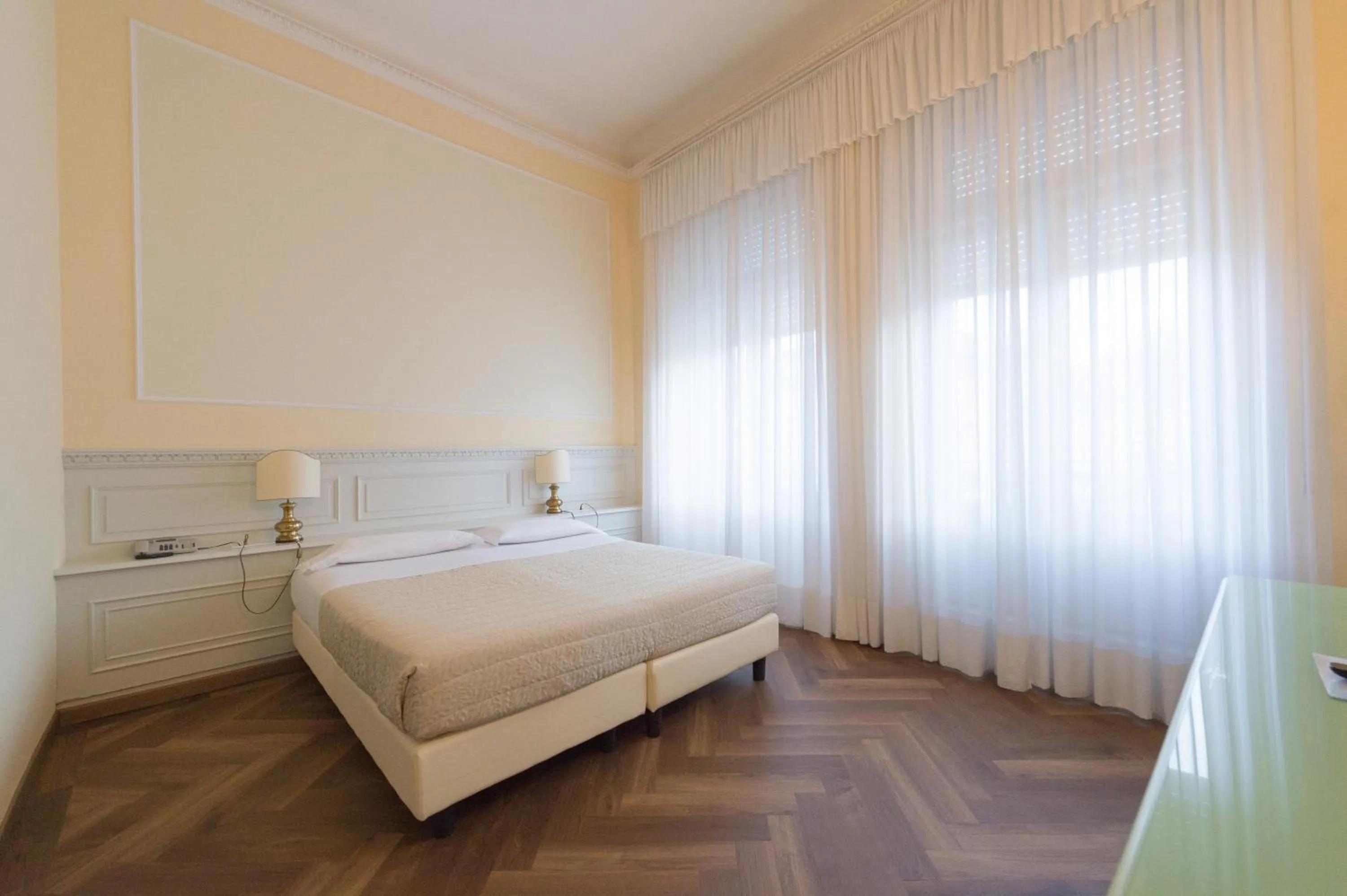 Bed in Grand Hotel Liberty