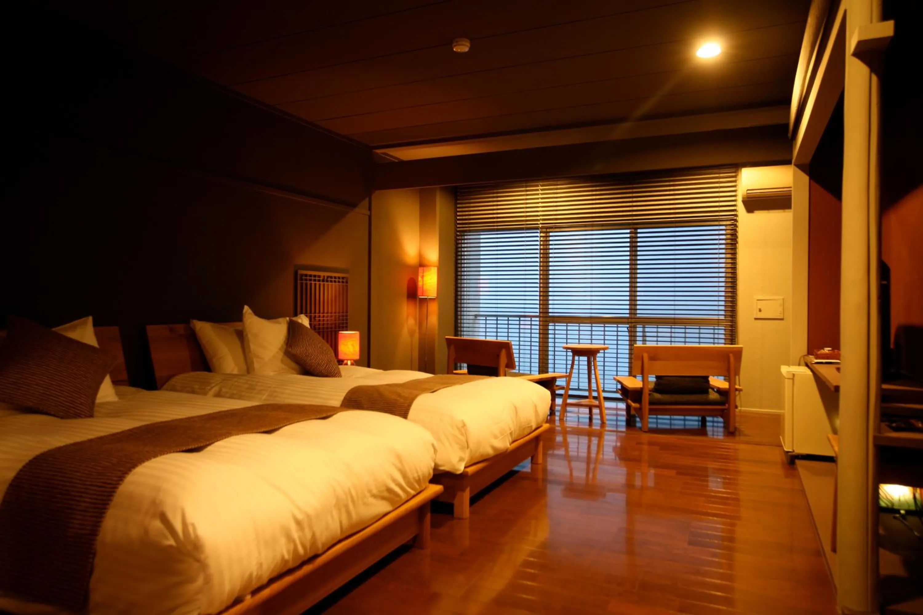 Photo of the whole room, Bed in Tabinoyado Ushionoakari Geiboso